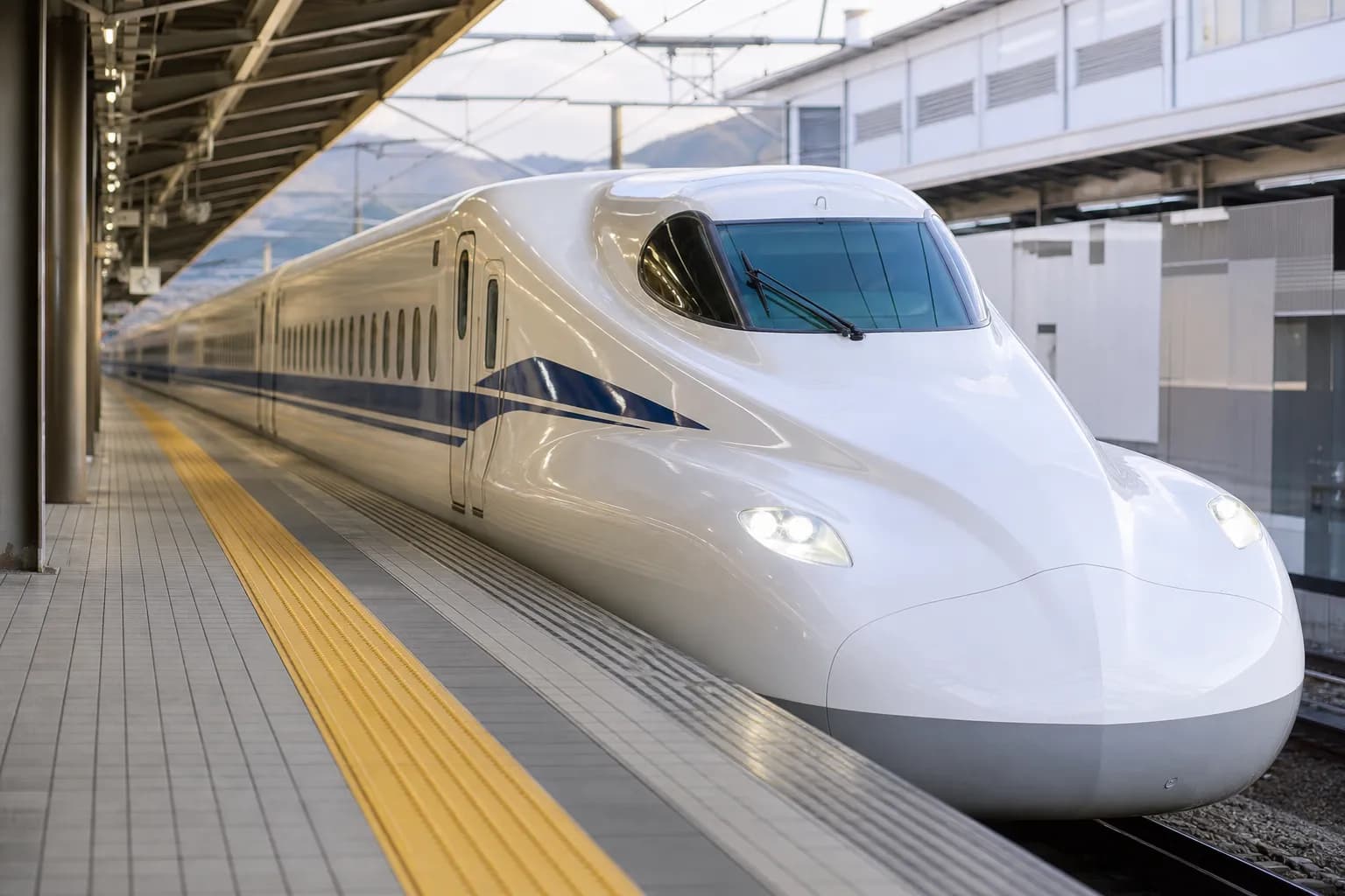 Tokaido Shinkansen bullet train at a station platform in Japan