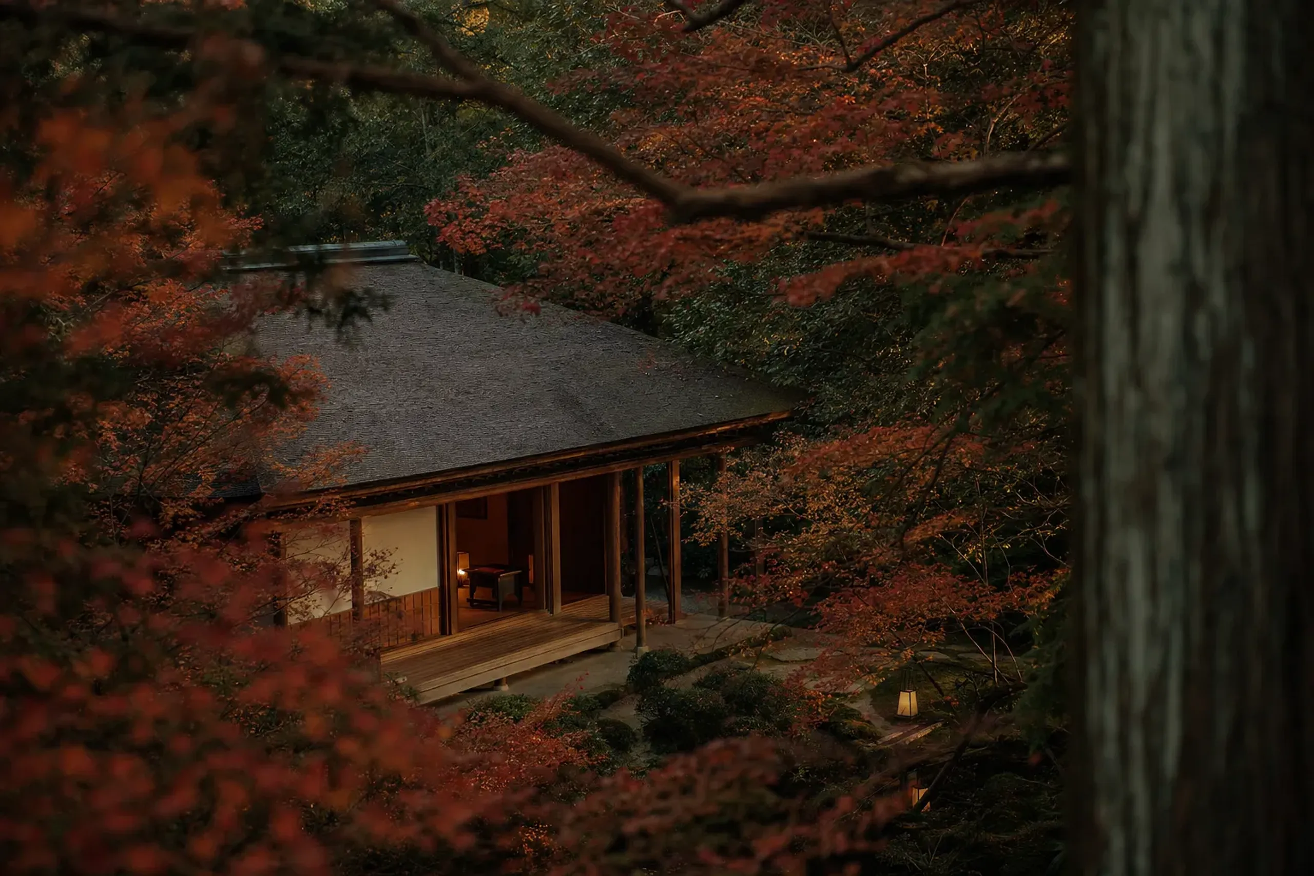 The Taka-An dining pavilion at Aman Kyoto, its restrained hinoki-timber structure set among the trees of the historic Takagamine artist district once home to Hon'ami Kōetsu's craftsmen village