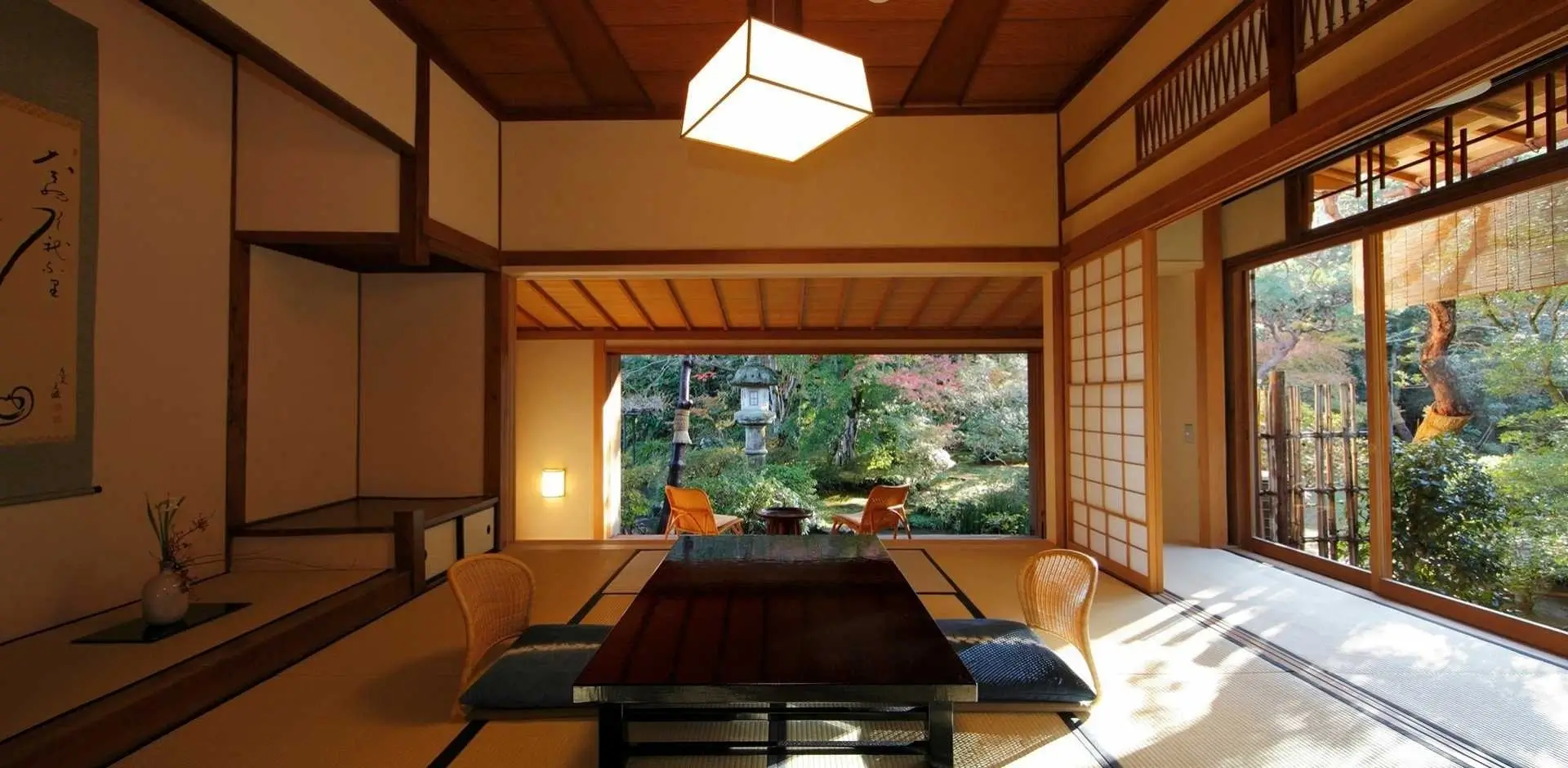 Tatami guest room at Asaba Ryokan with shoji screens and an engawa facing the garden
