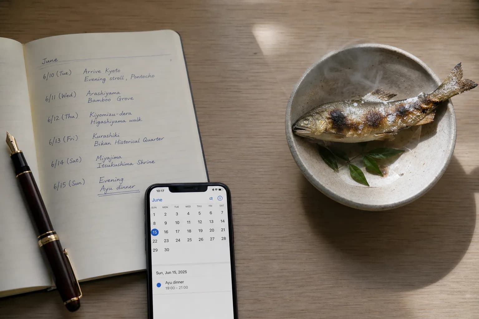 Notebook and calendar used to plan ukai season dates and dinner timing, paired with a small seasonal dish