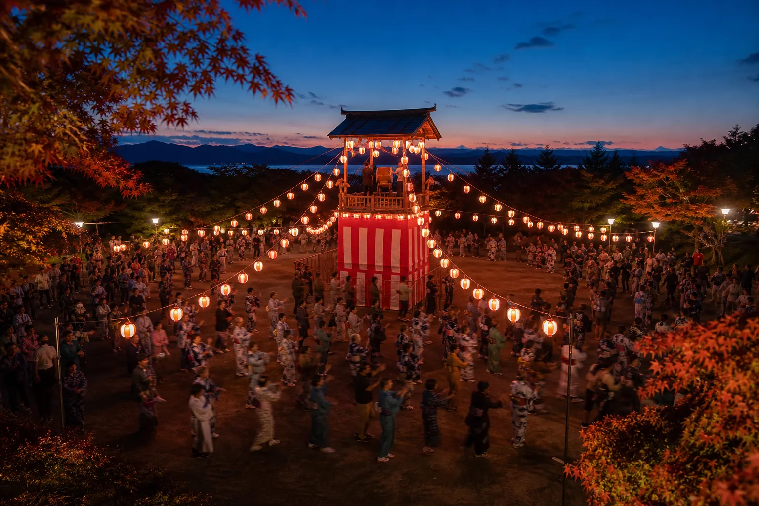 Bon Odori dance circle in Hokkaido around a lantern-lit yagura tower at dusk