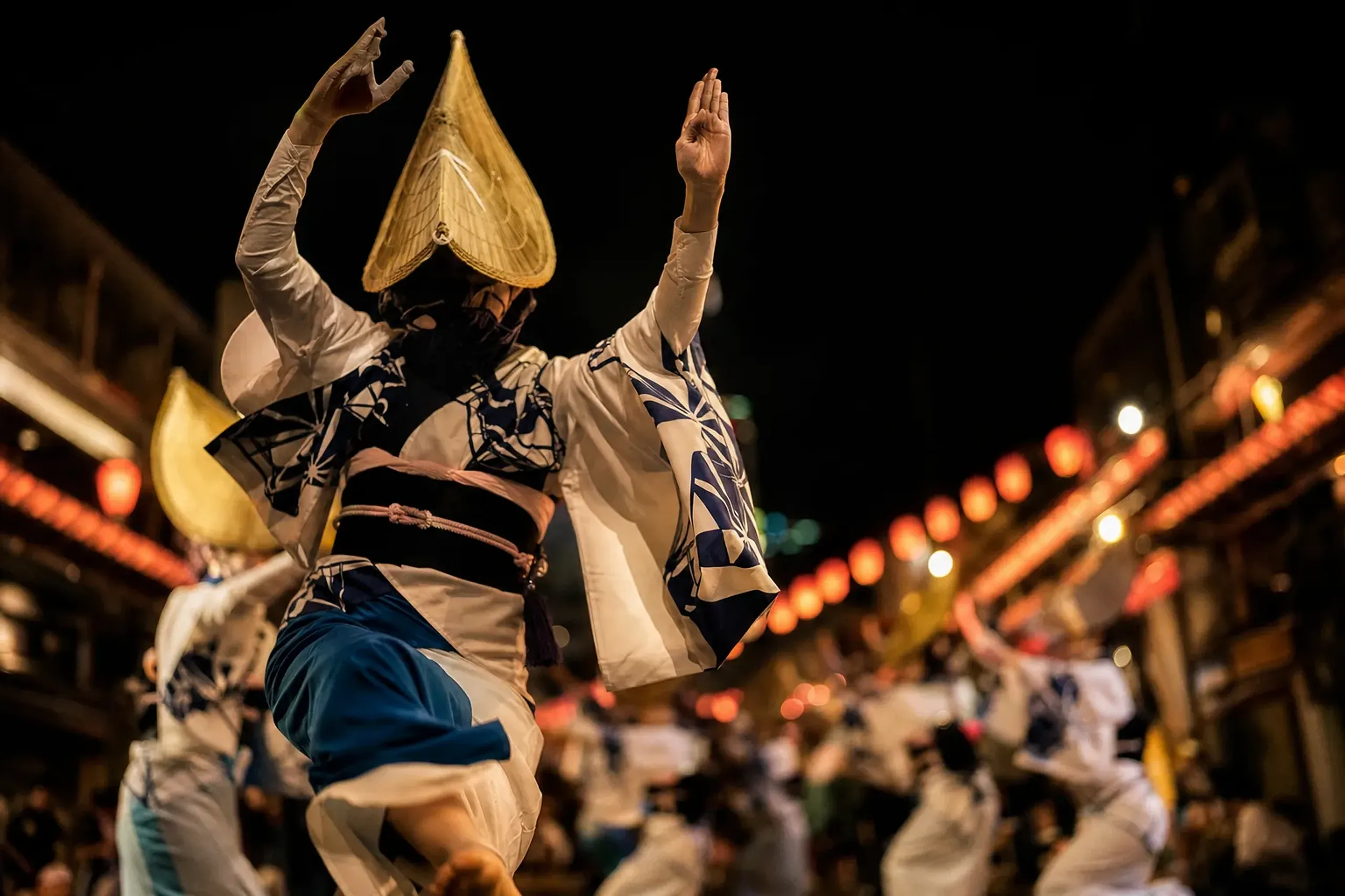 Awa Odori dancers performing in downtown Tokushima at night