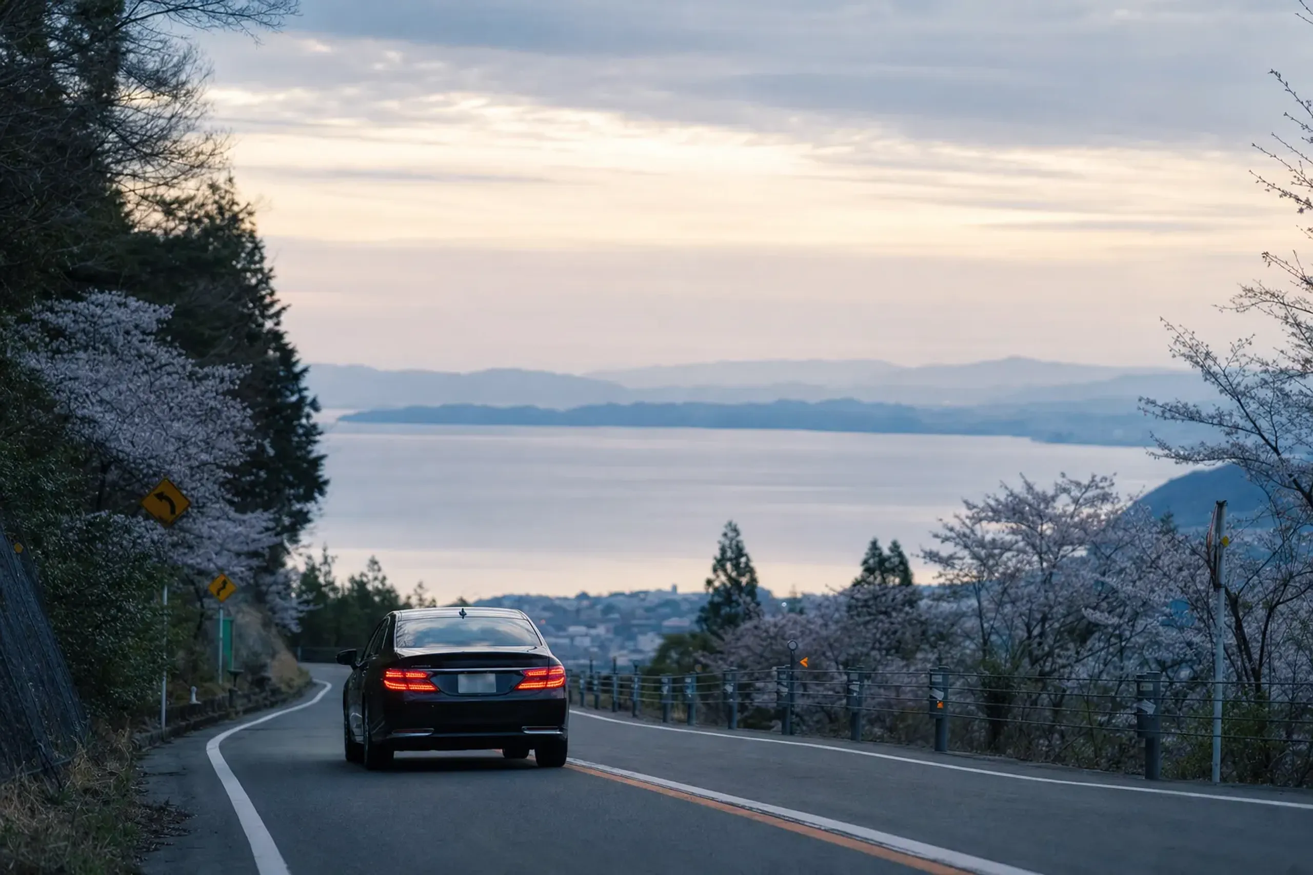 a private chauffeured car on the road between Kyoto and the western shore of Lake Biwa in Shiga Prefecture