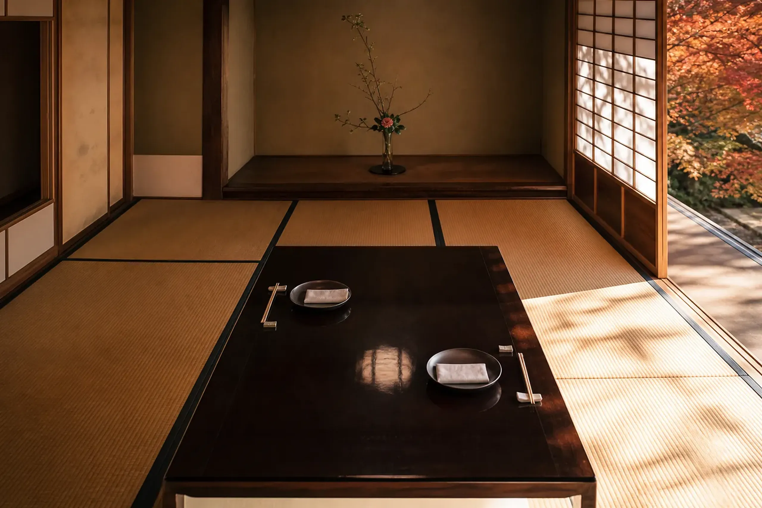 Japanese private dining room with shoji screens and table set for two