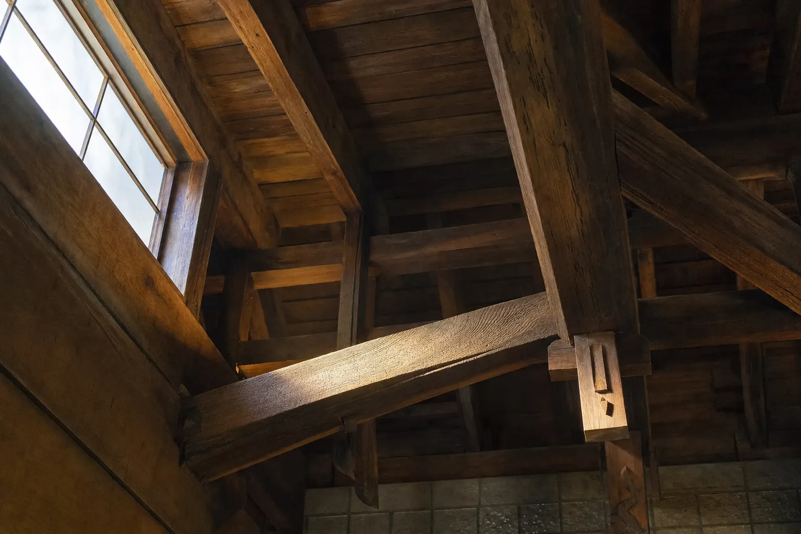 Look up and you see beams, joinery, and a discipline