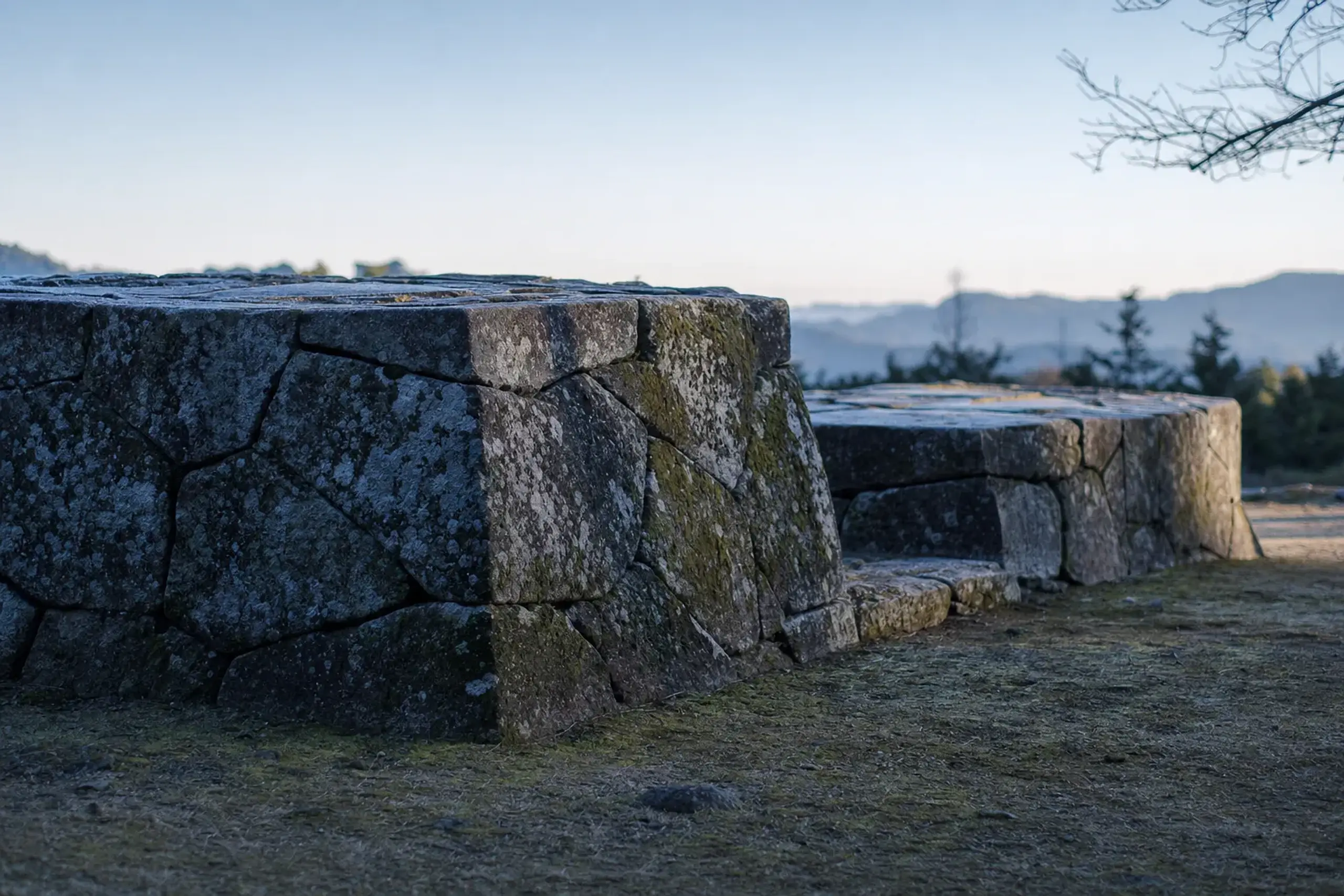 the three joined stone pedestals of the renritsu-shiki linked-platform keep base at Fukuoka Castle — the large main platform with middle and small platforms connected to it
