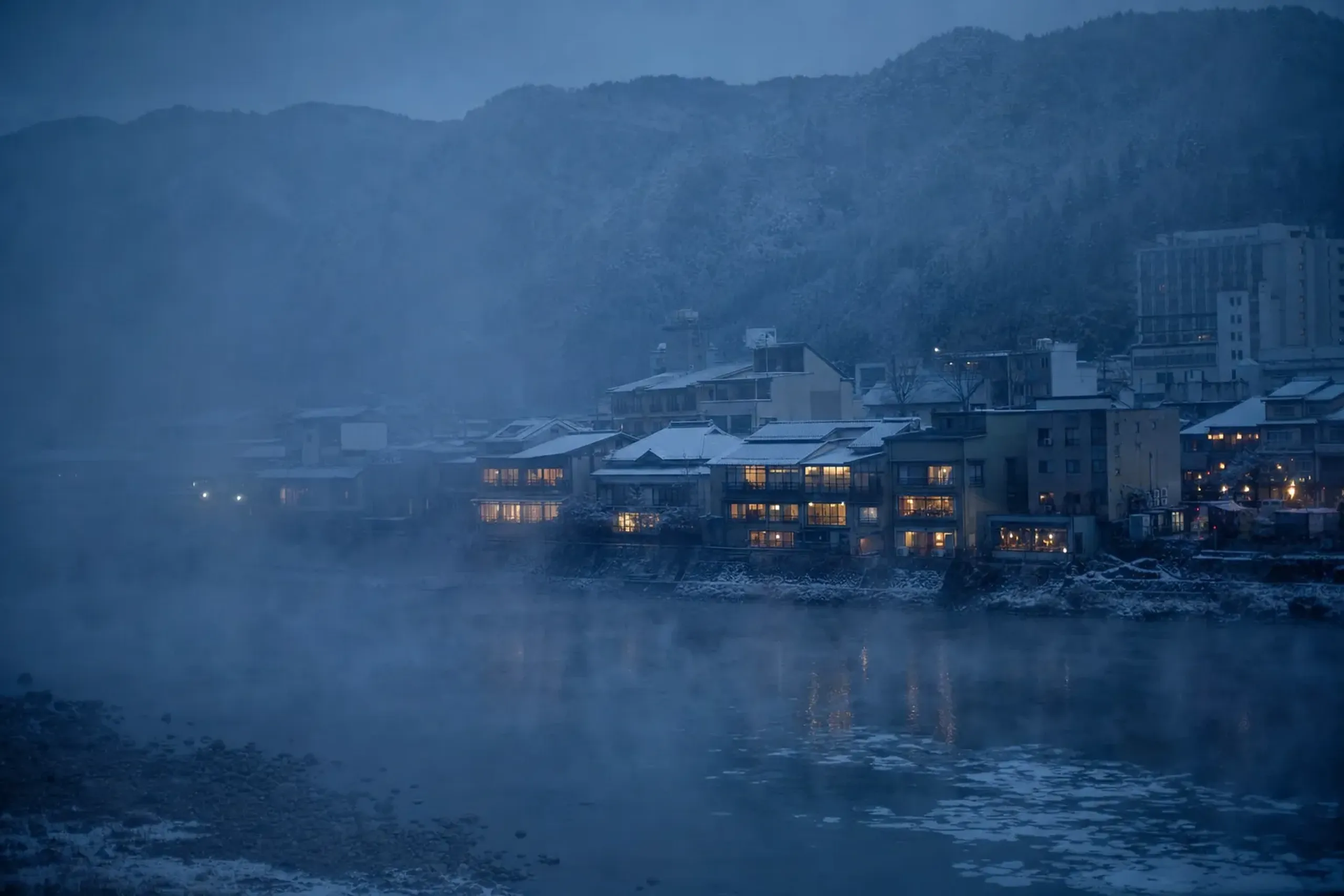 Gero Onsen town in a quiet mountain river valley under winter mist