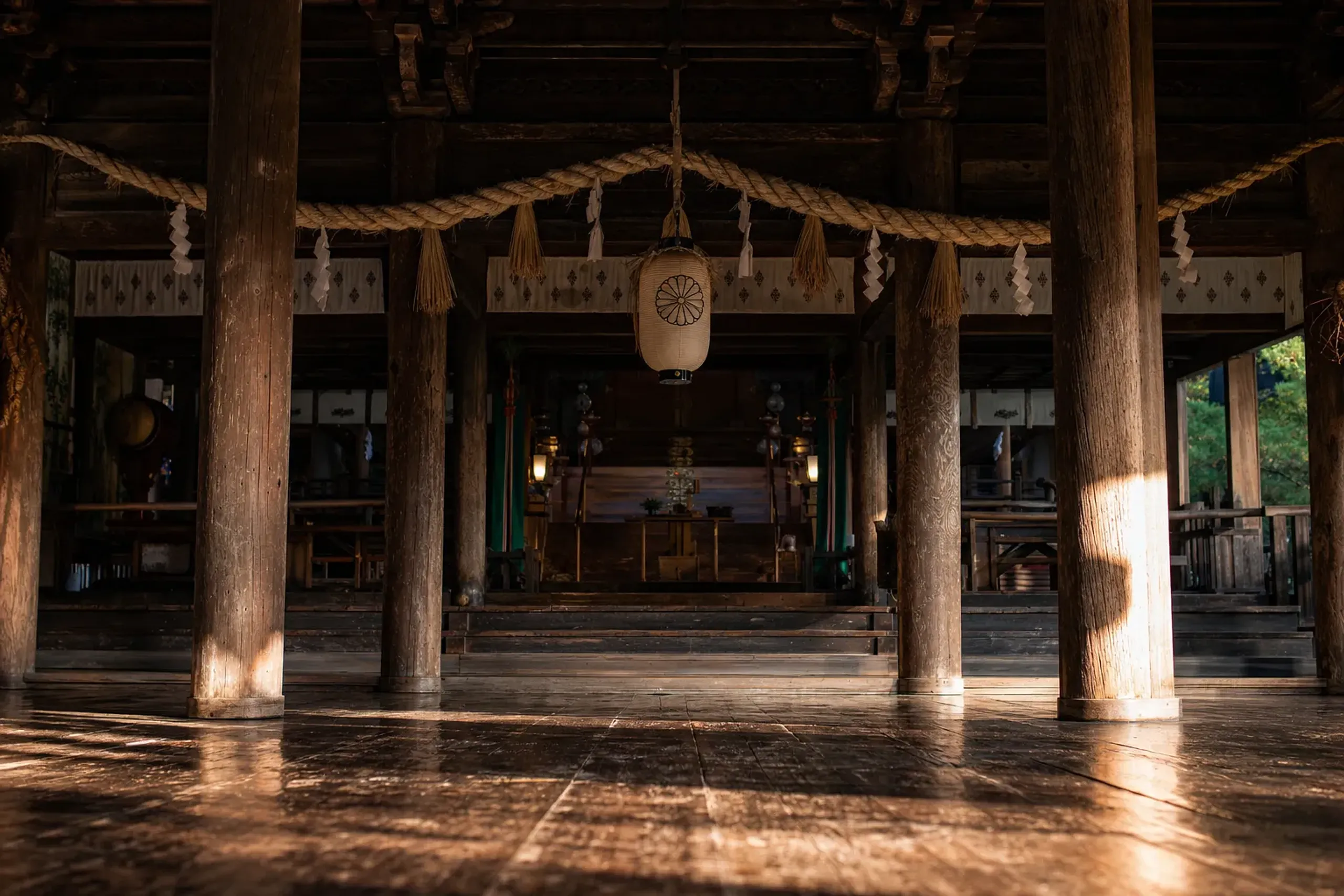 The quiet worship hall of a Gujō Hachiman shrine where overnight Bon dancing predates 1744