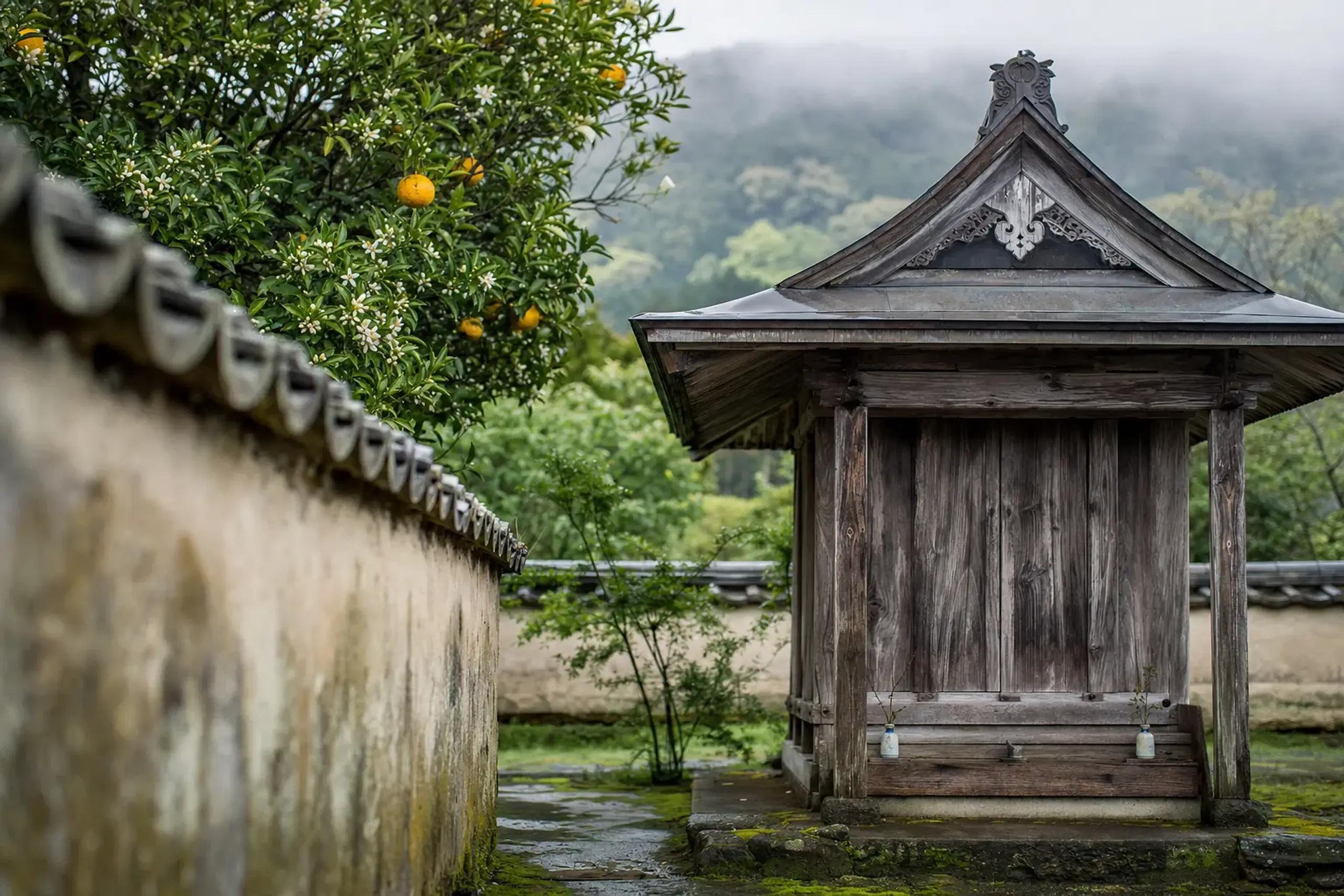 A short distance from the walls stands a modest wooden