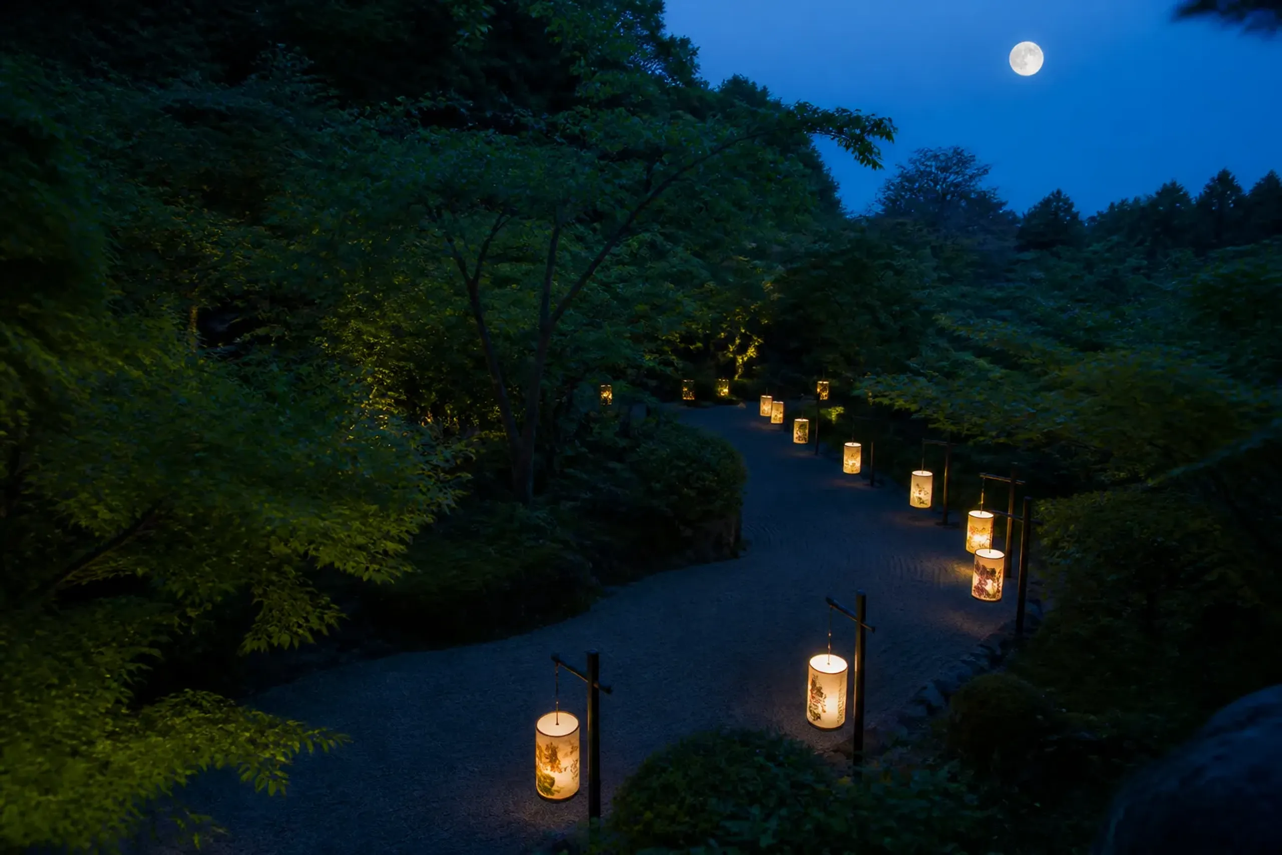 Hand-painted paper lanterns lighting the paths of an Edo-period garden at night in Tokyo