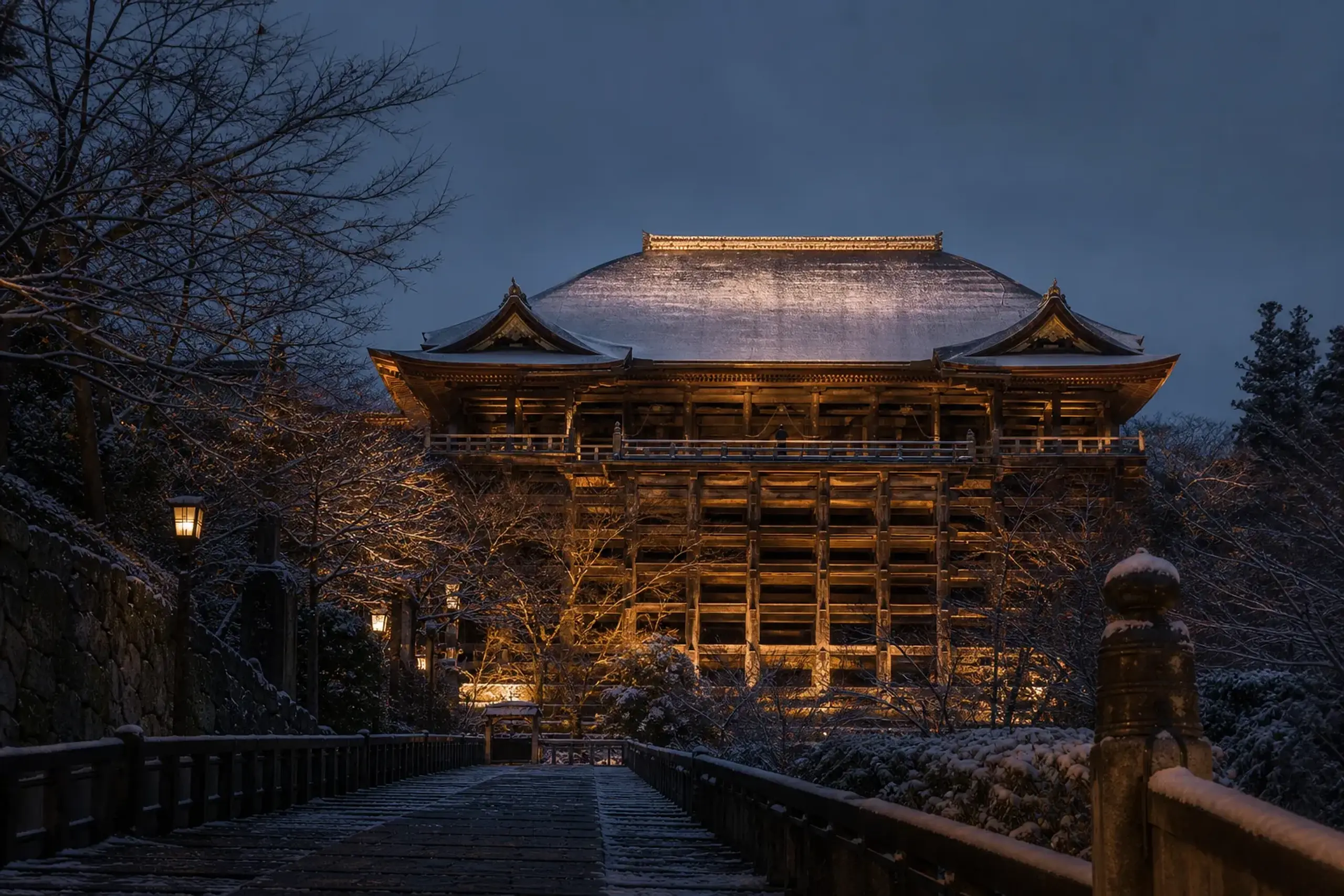 Kiyomizu-dera temple illuminated at night in Kyoto with minimal visitors