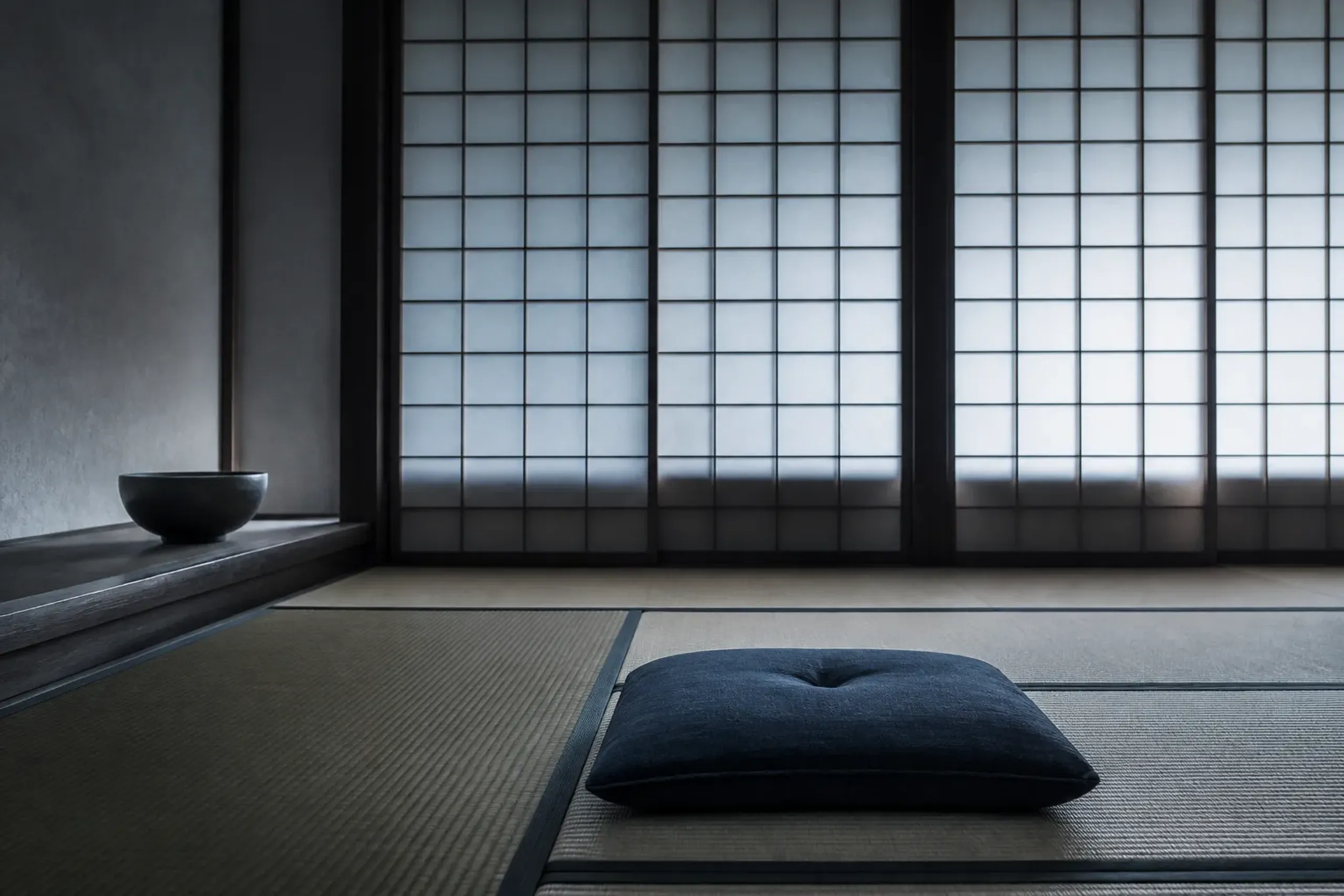 Quiet tatami meditation room with shoji screens in a Kyoto Zen temple
