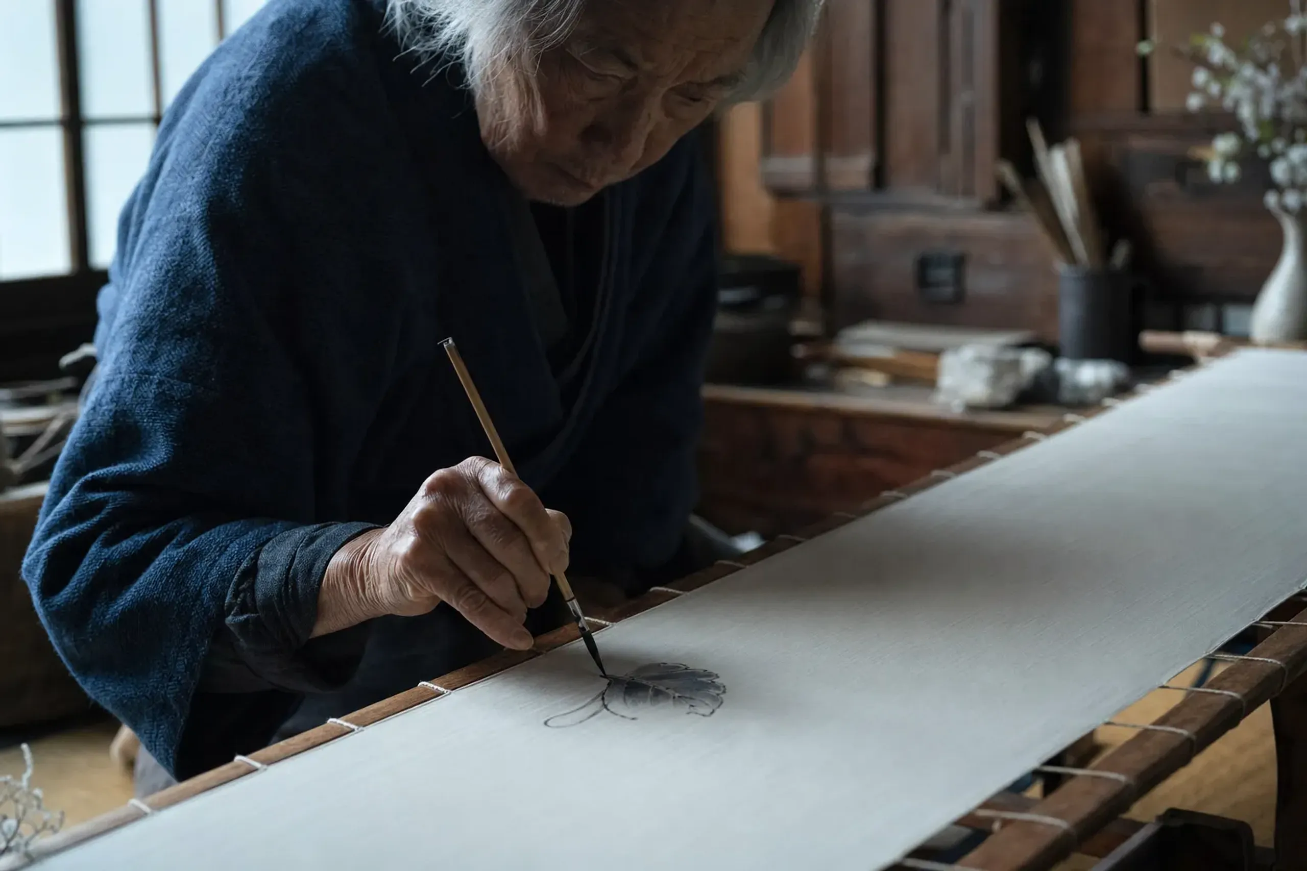 Yūzensai made his name in Kyoto. Then, around 1712, he