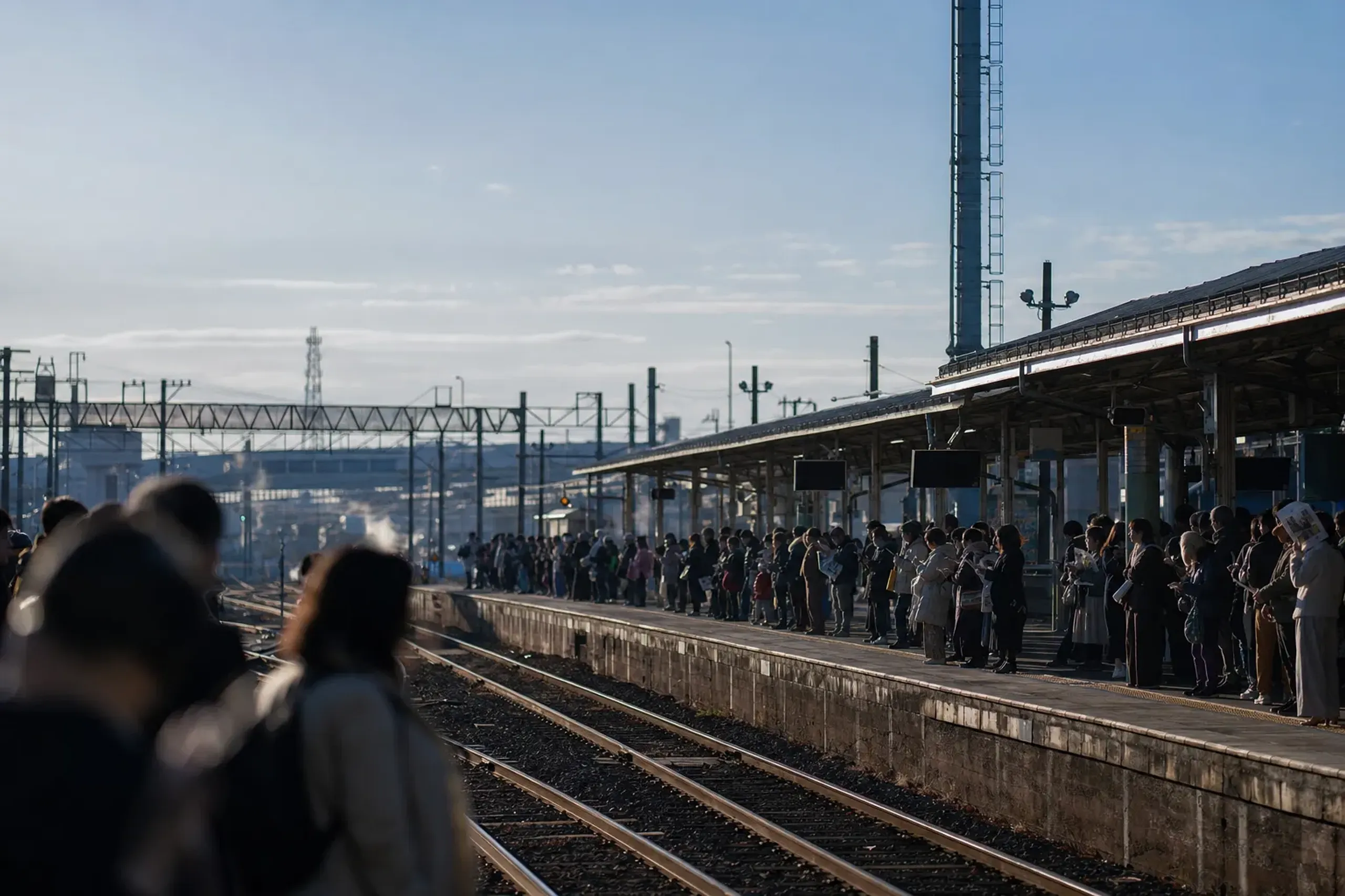 The exterior platform and tracks of Karatsu Station in Saga Prefecture during the crowded November festival days