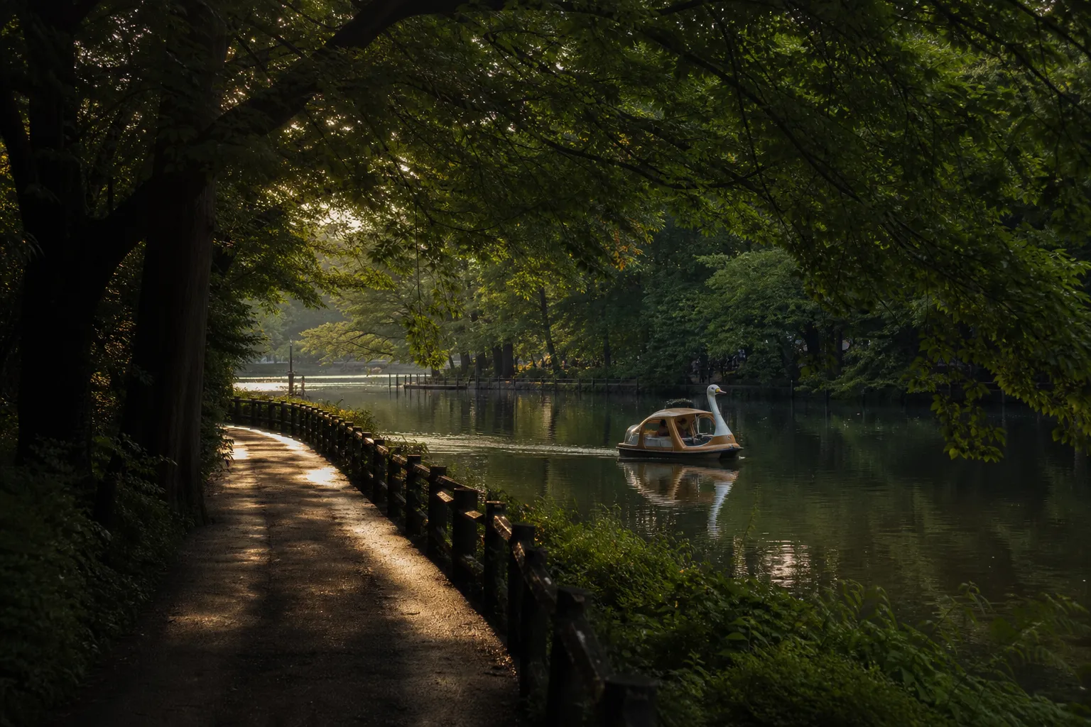 Inokashira Park pond and tree-lined walking path near Kichijoji in Tokyo