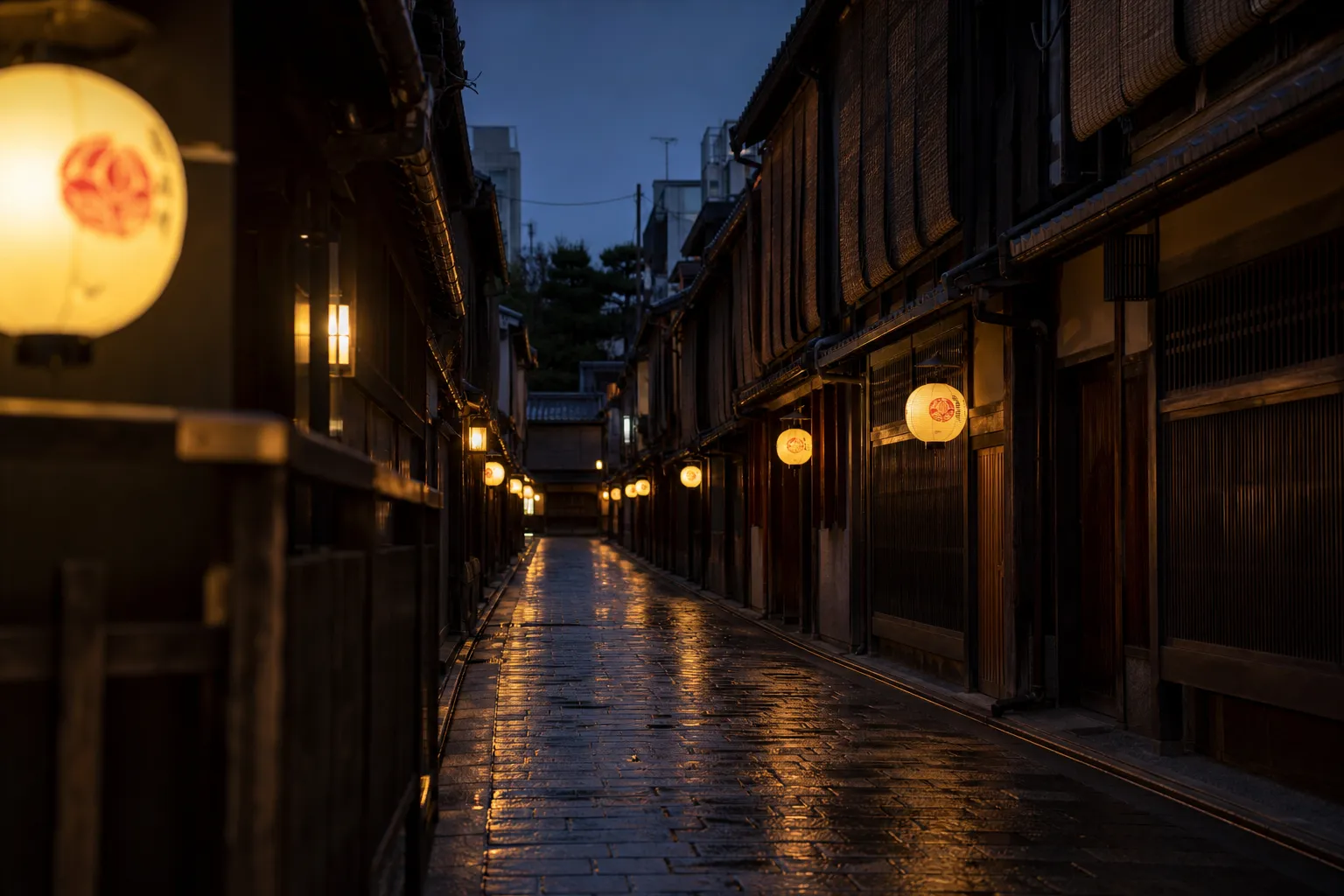 Lantern-lit traditional wooden lane in Kyoto's Miyagawa-cho geiko district at night