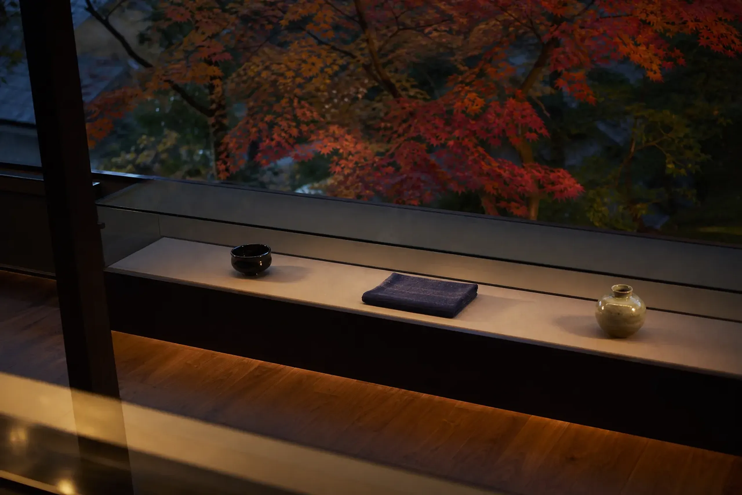 Quiet display gallery of Kyoto crafts including lacquer, textiles and ceramics at the Kyoto Traditional Industry Museum
