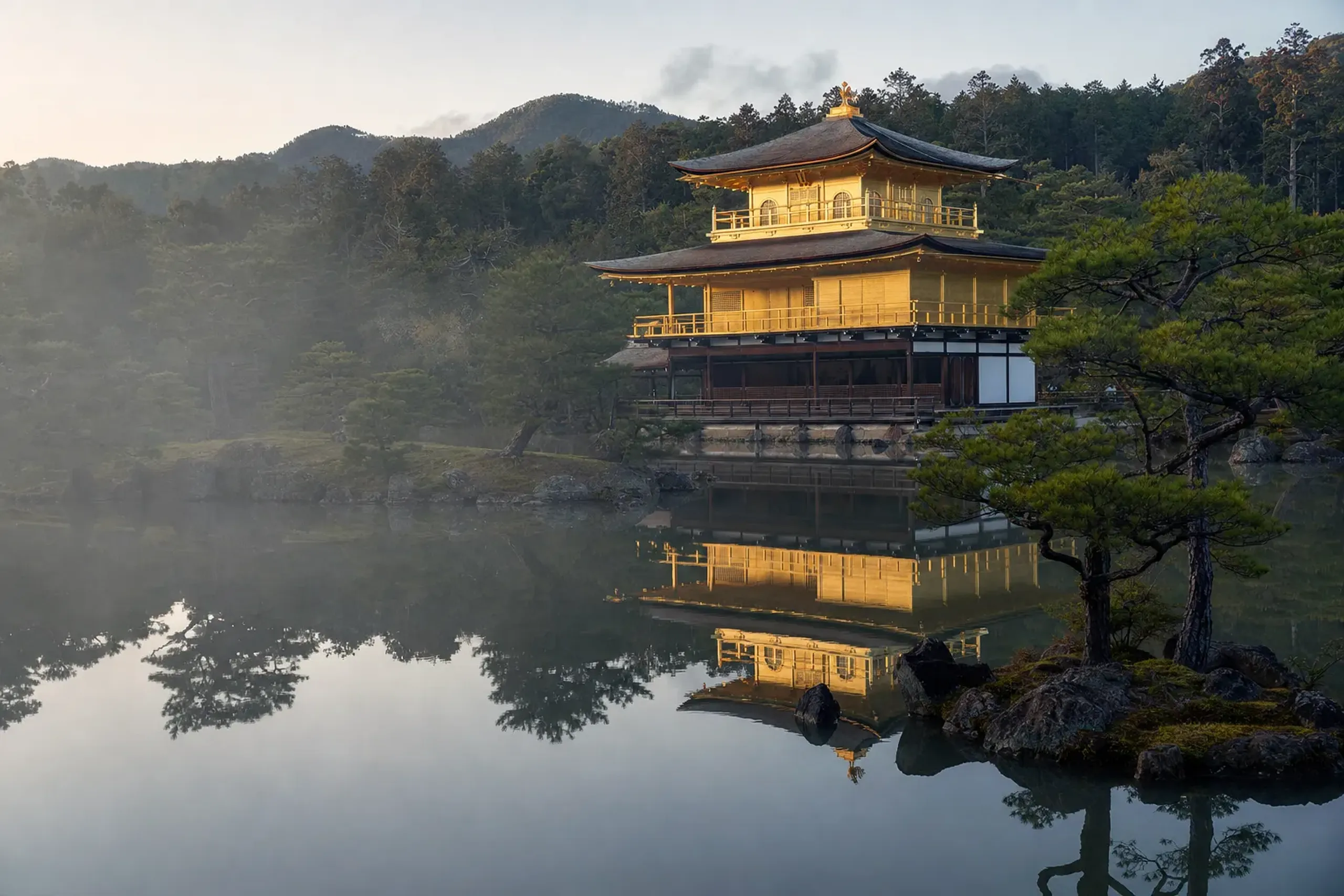 The golden pavilion of Kinkaku-ji reflected in its mirror pond in Kyoto