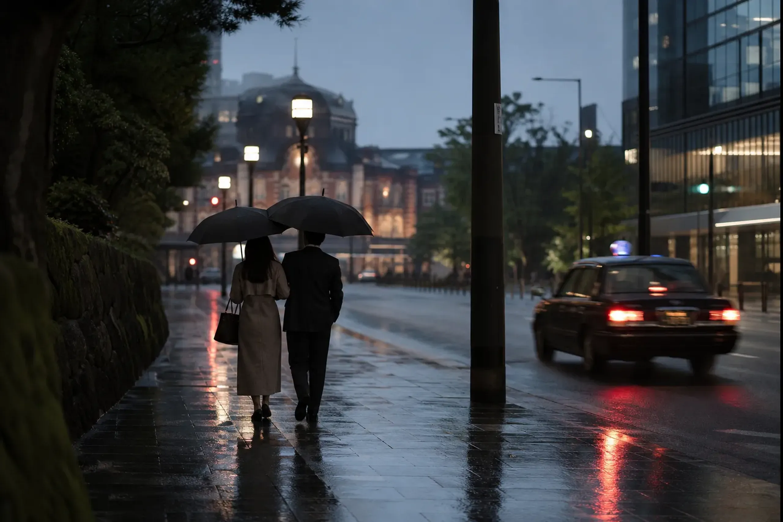 Walkable streets near Tokyo Station and Yaesu at twilight with taxis and pedestrians