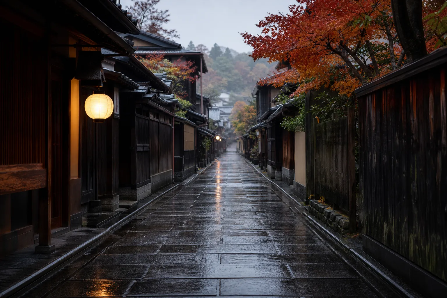 Quiet Kyoto lane in early morning with wet stone pavement and traditional wooden facades