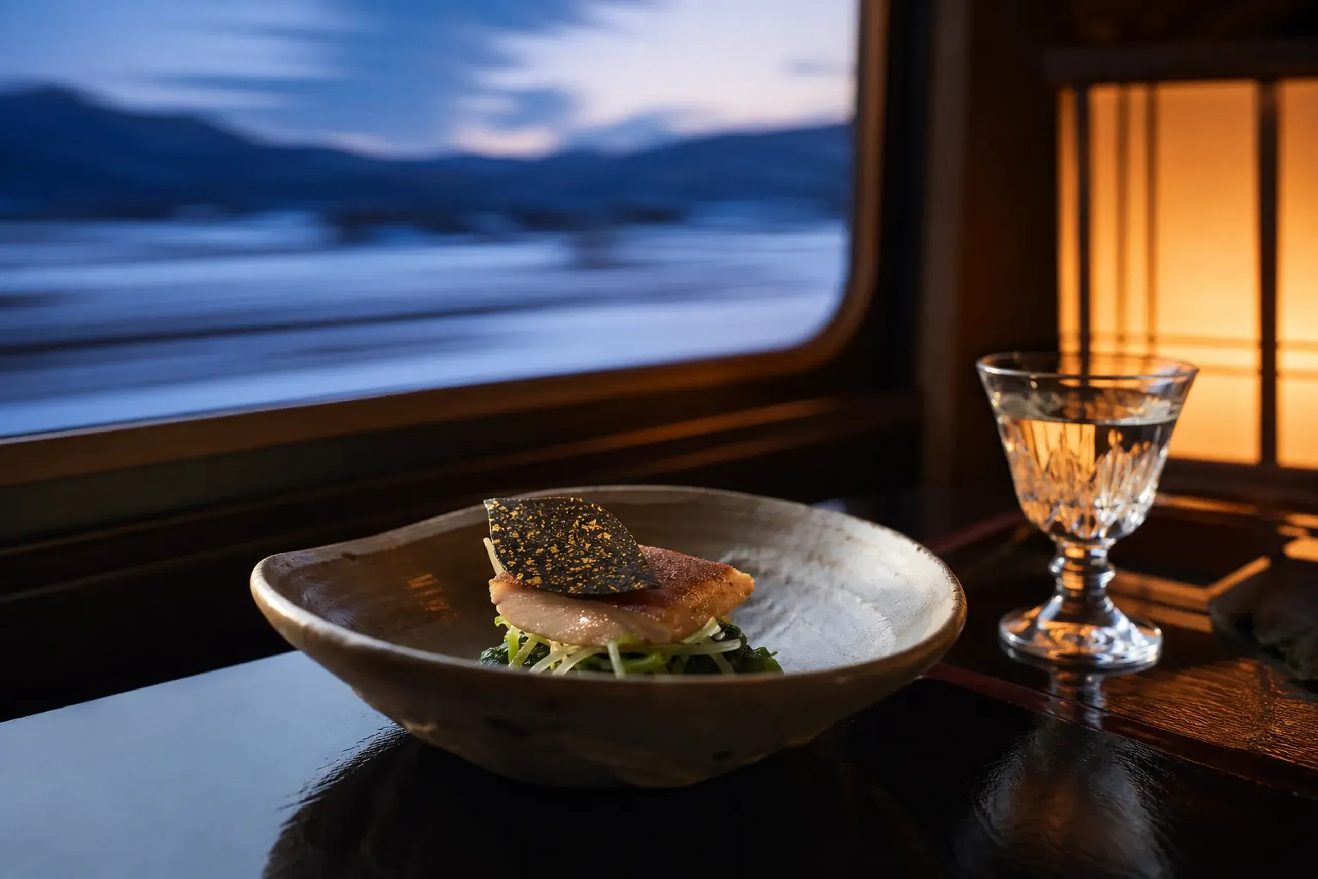 Plated meal served on Train Suite Shiki-shima with Japanese tableware