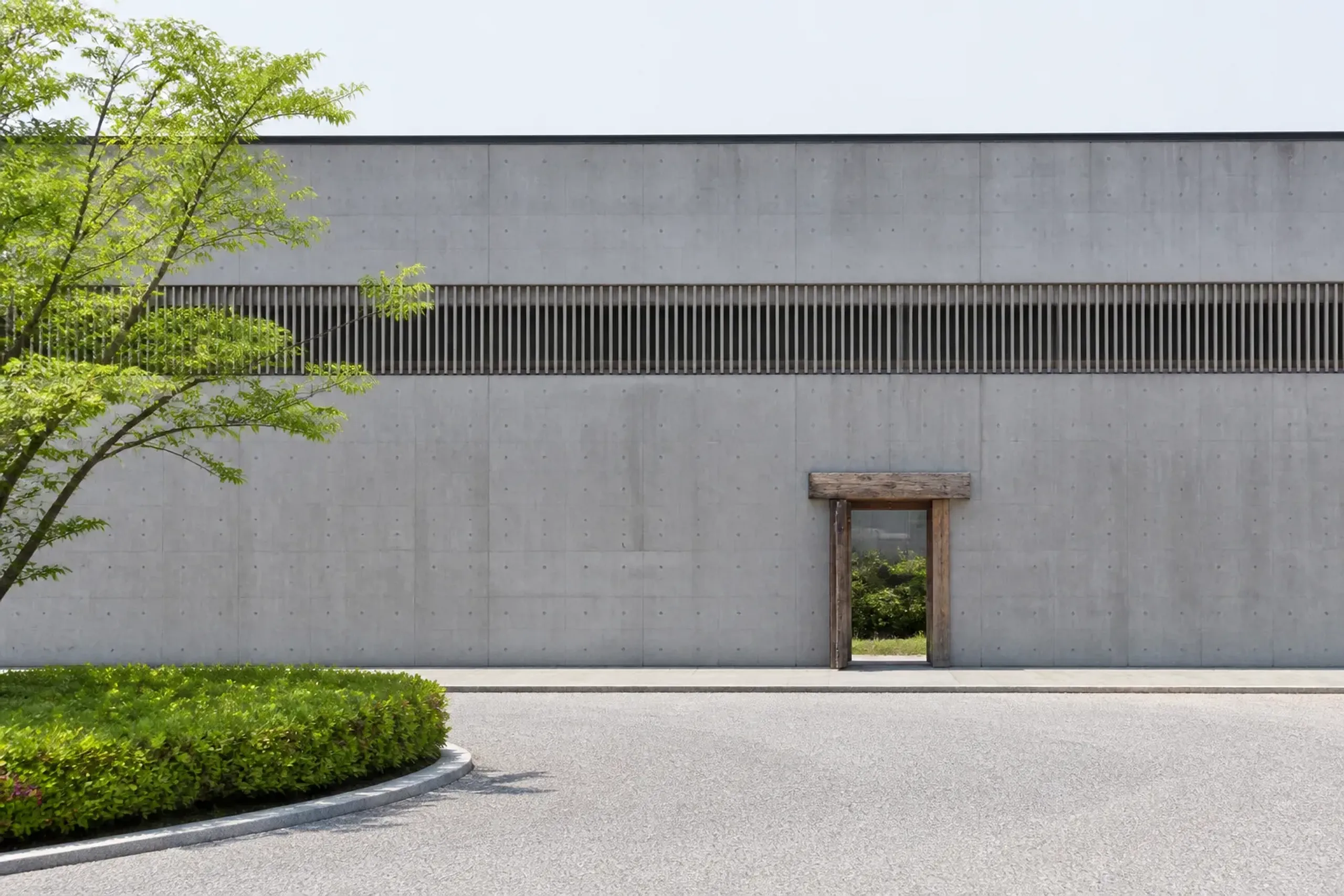 Plain daylight view of a rebuilt sake museum building in Kobe’s Nada district