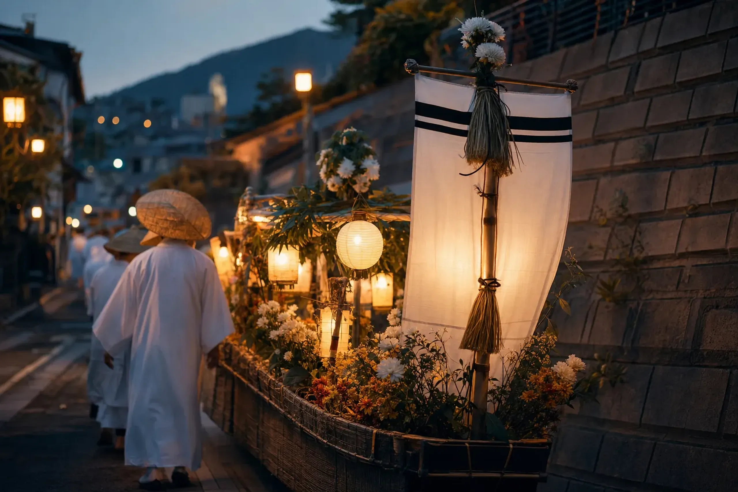 an ornate decorated spirit boat illuminated by lanterns during Nagasaki's Shōrō Nagashi procession