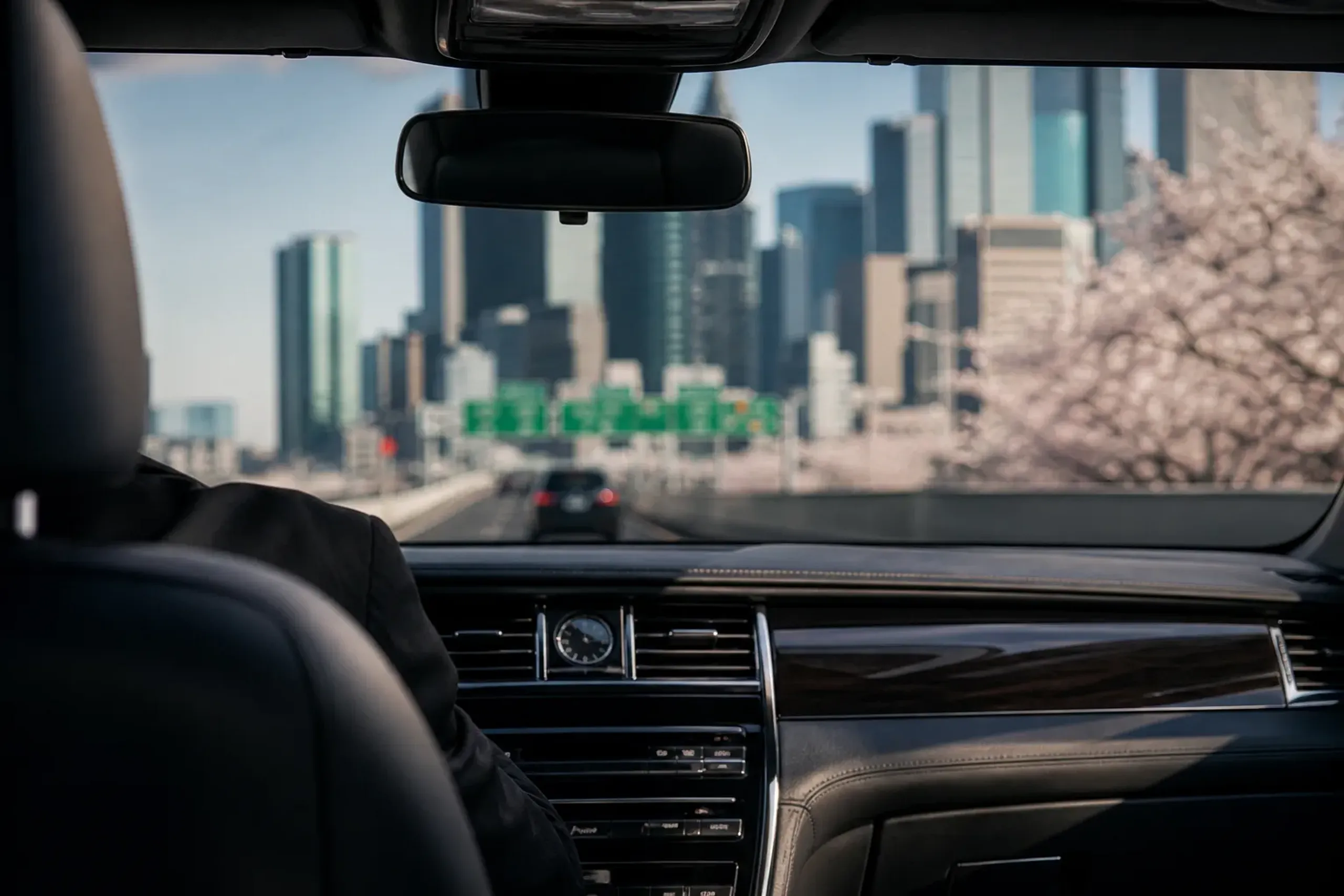 View from inside a chauffeured car on the expressway approaching central Tokyo