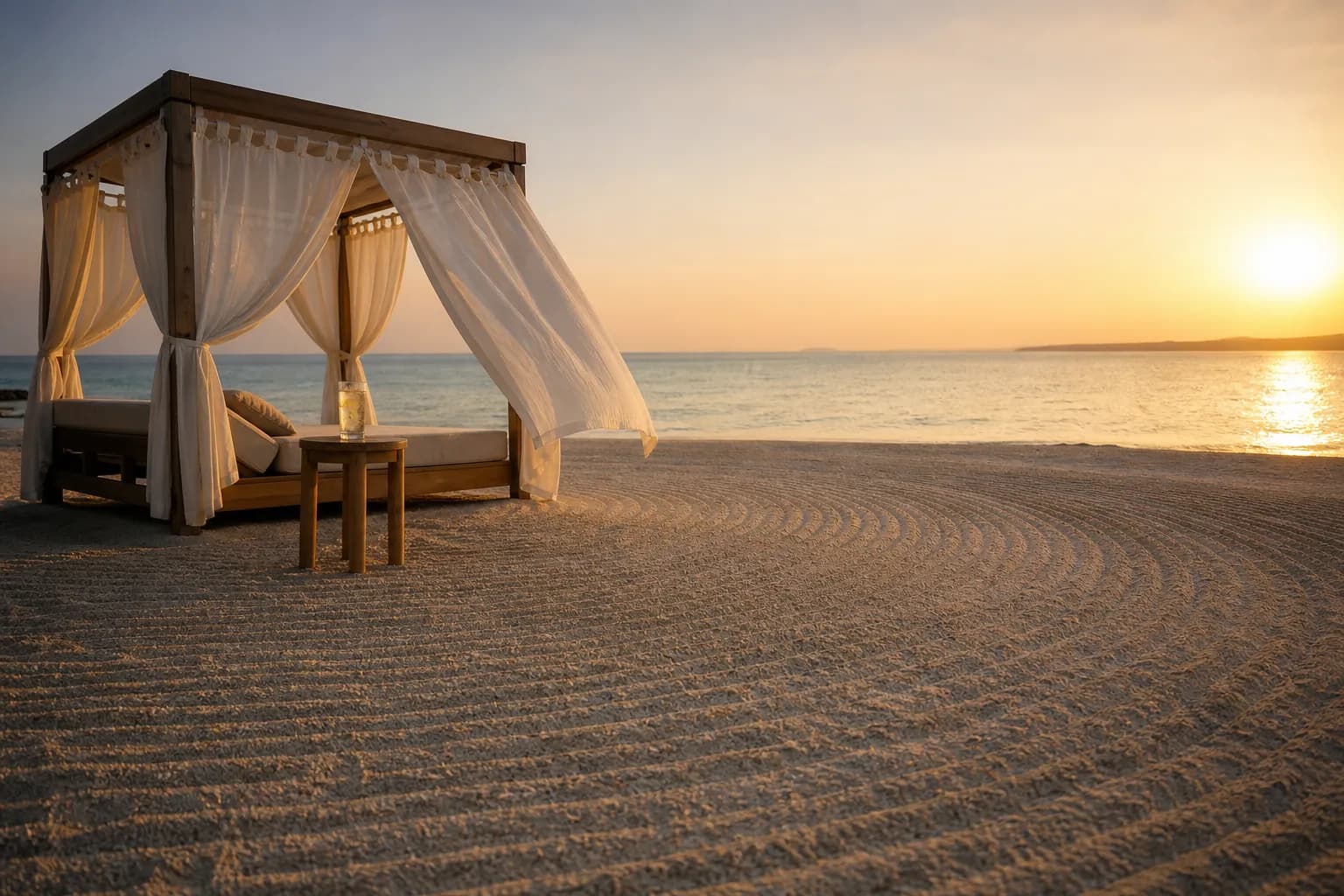 A single private beach cabana, freshly raked sand around it, on the guest-only shoreline of The Atta Terrace Club Towers along the Onna coast at golden hour, a chilled beverage resting on the cabana's