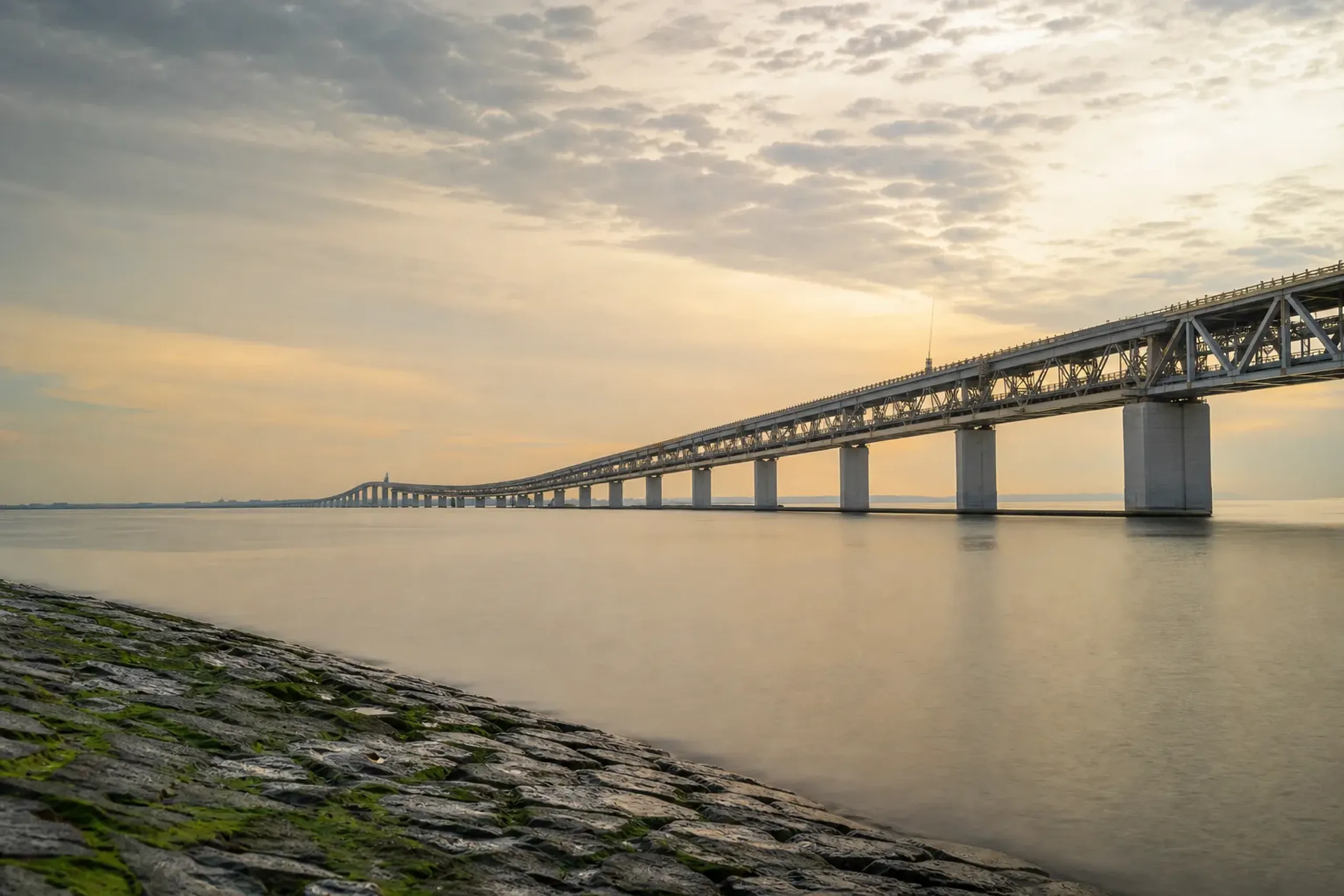 The elevated Skygate Bridge connecting Kansai International Airport to the mainland, seen stretching across the bay of Osaka
