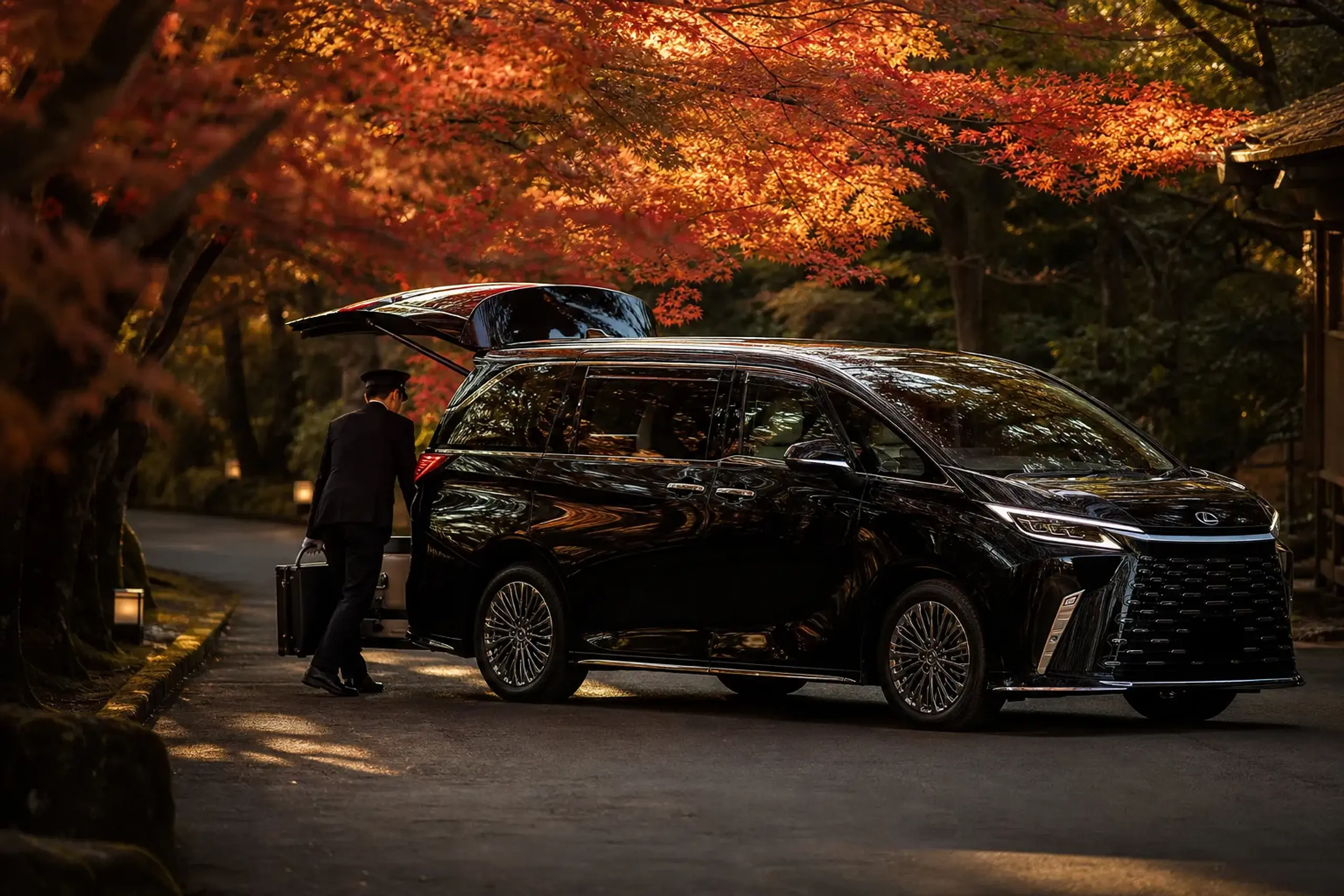Luxury minivan on a Hakone road handling a heliport to hotel transfer in Japan