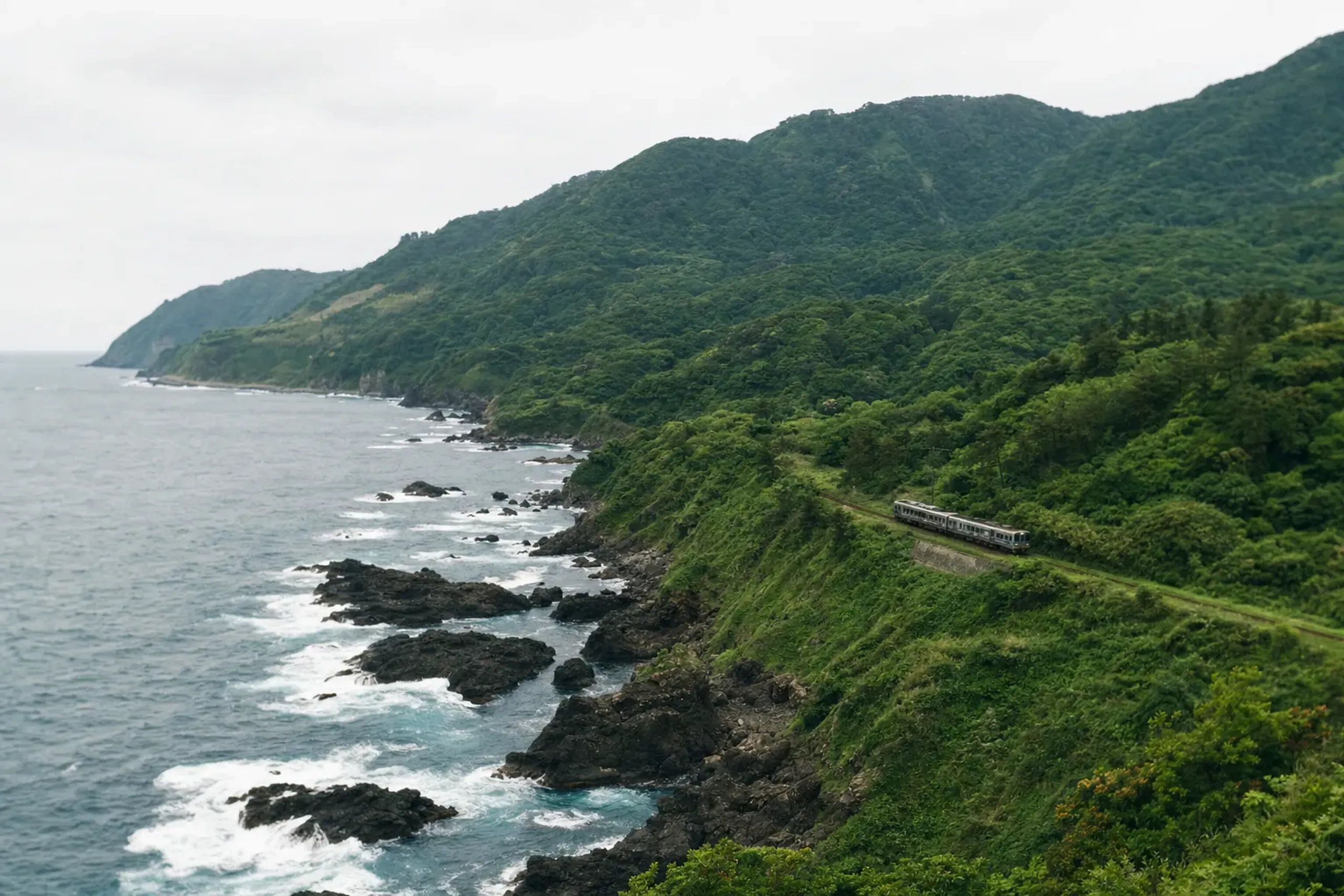 Lush valley and rugged coastline of the San'in region in Japan