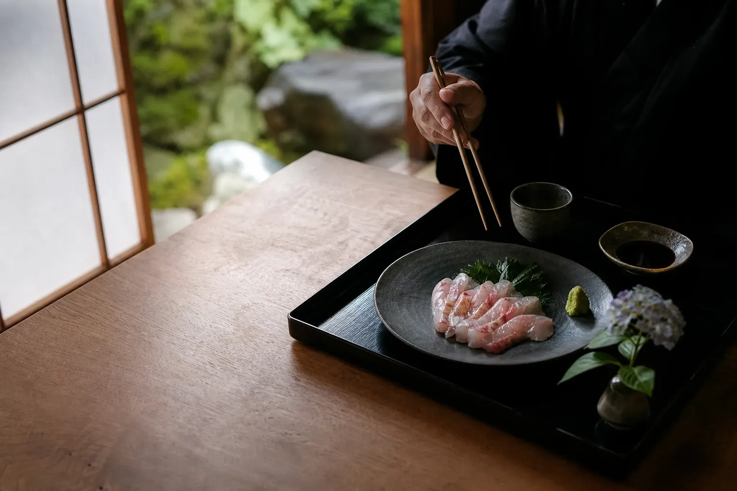 Kaiseki course in an Izu ryokan featuring kinmedai sashimi and freshly grated wasabi