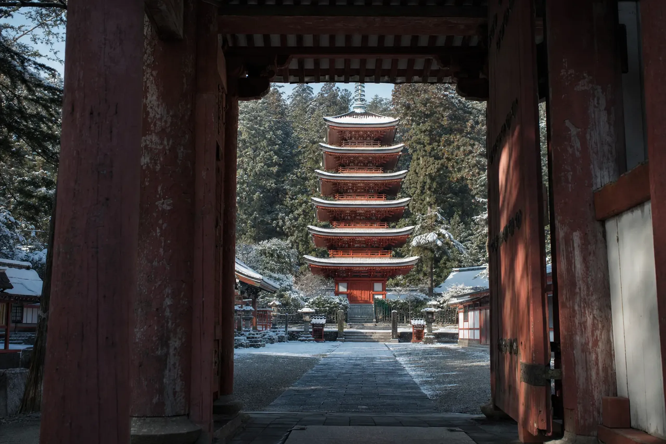 The five-story pagoda of Shitennō-ji rising along the central north-south axis in the Tennōji ward of Osaka, seen from the south gate