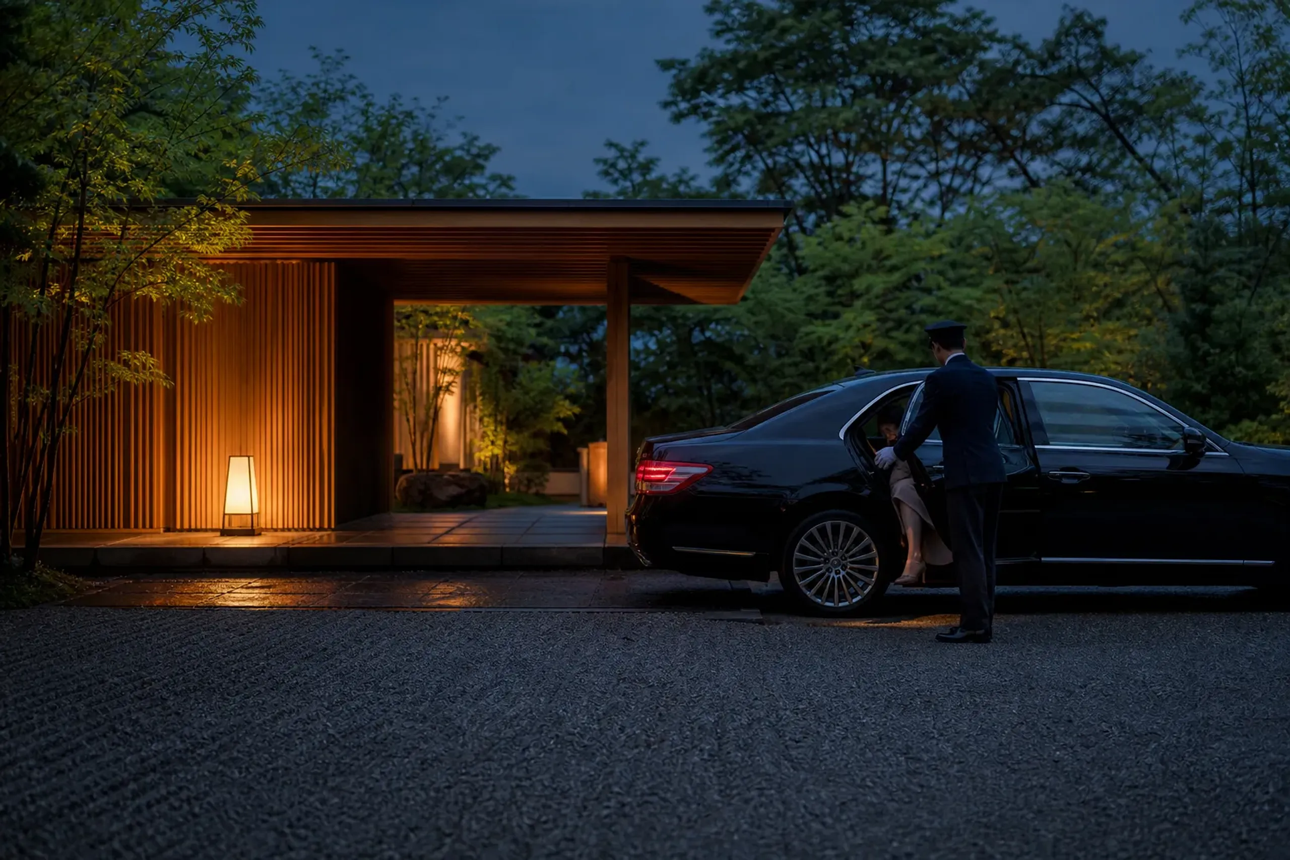 Chauffeur-assisted discreet hotel arrival at a private entrance in Japan