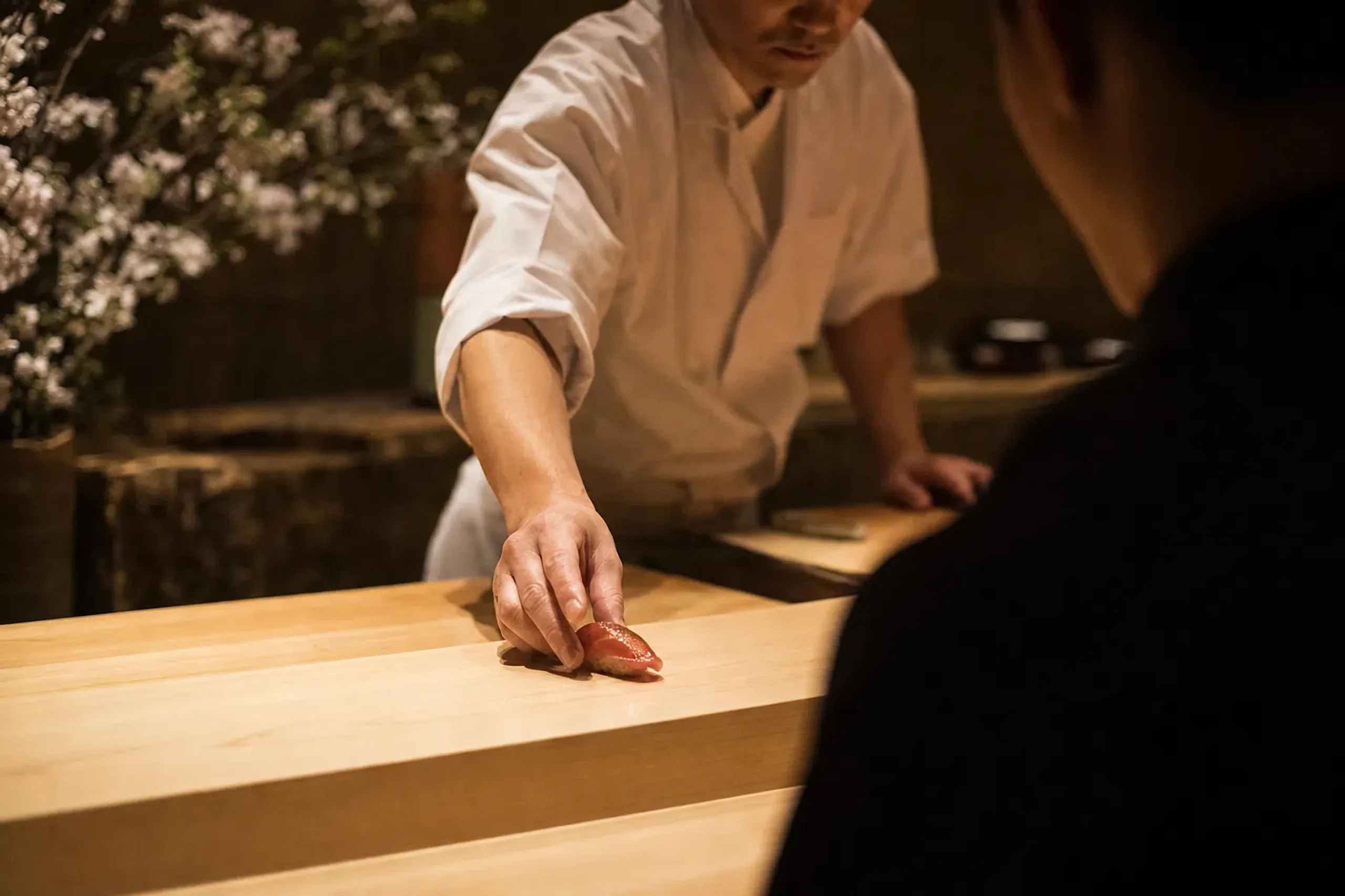 At an omakase sushi counter, the chef decides the order