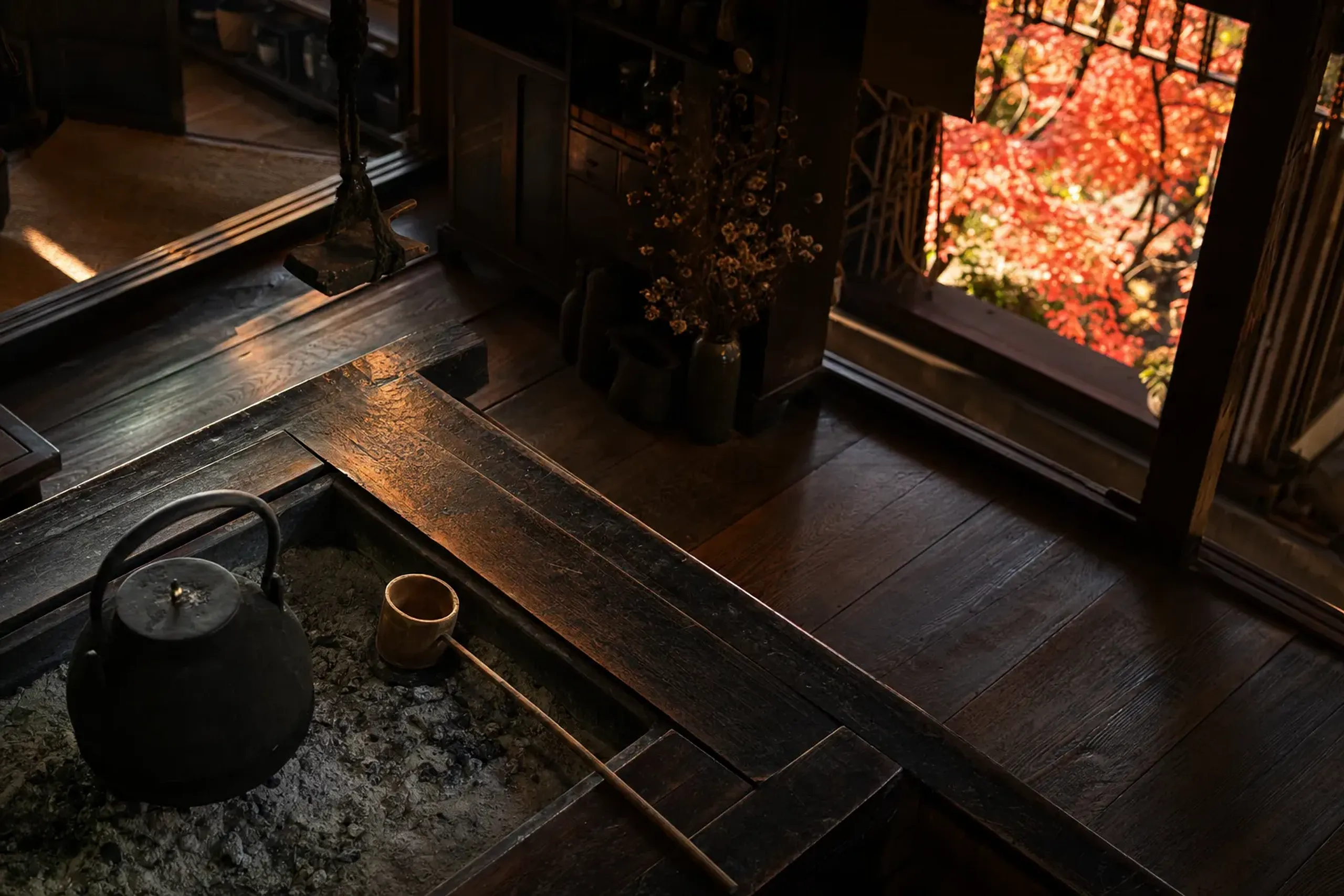 the preserved interior timber joinery and domestic tools of the Yoshijima Heritage House merchant residence in Takayama