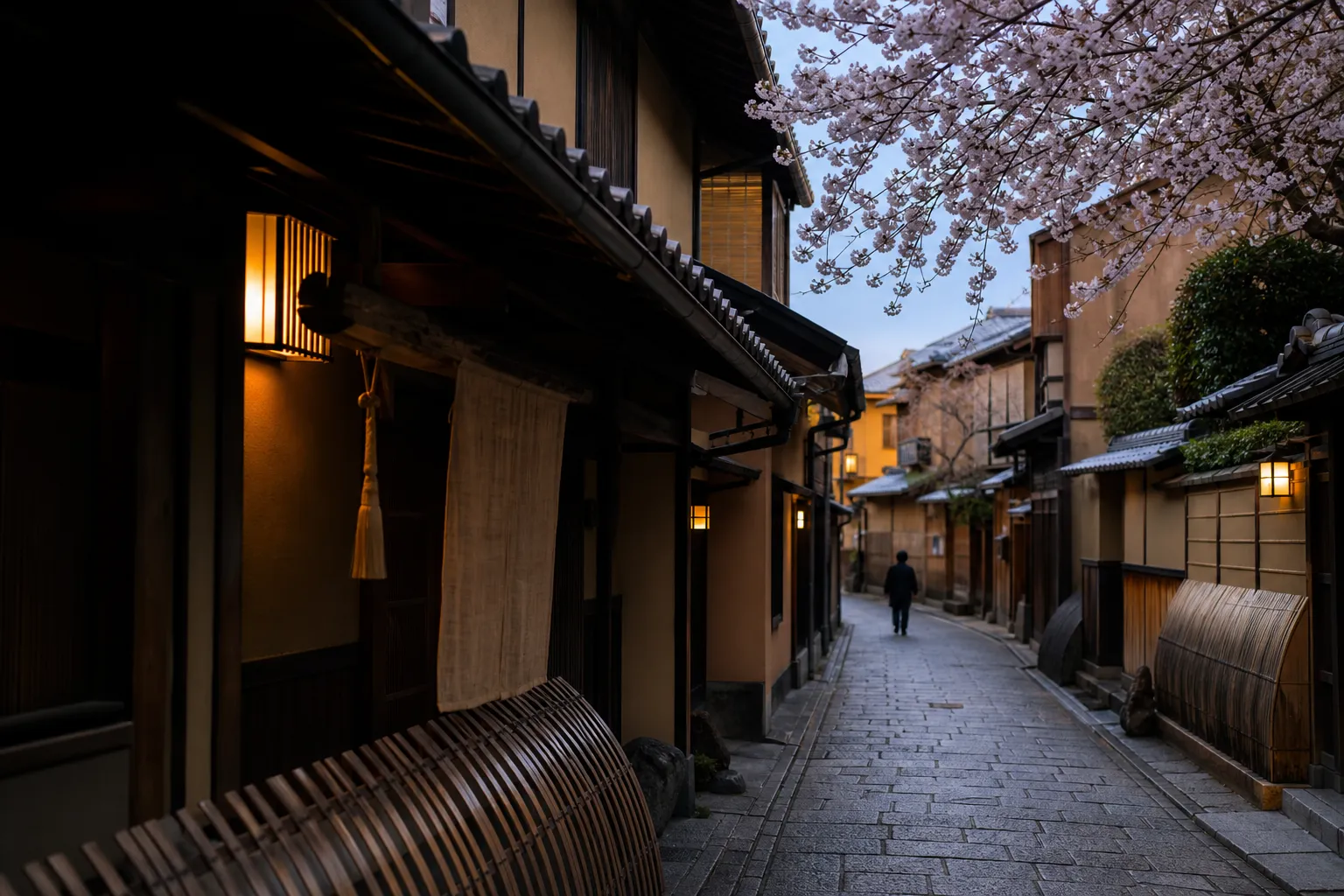A quiet Kyoto lane with traditional townhouses and soft morning light