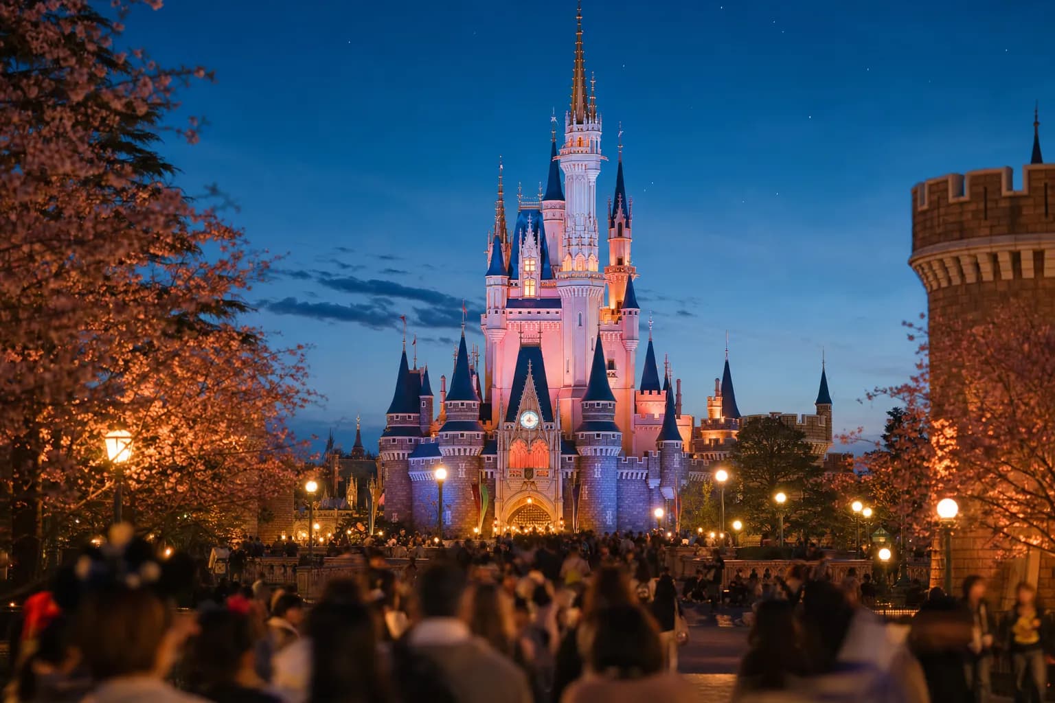 Cinderella Castle at Tokyo Disneyland illuminated in the evening