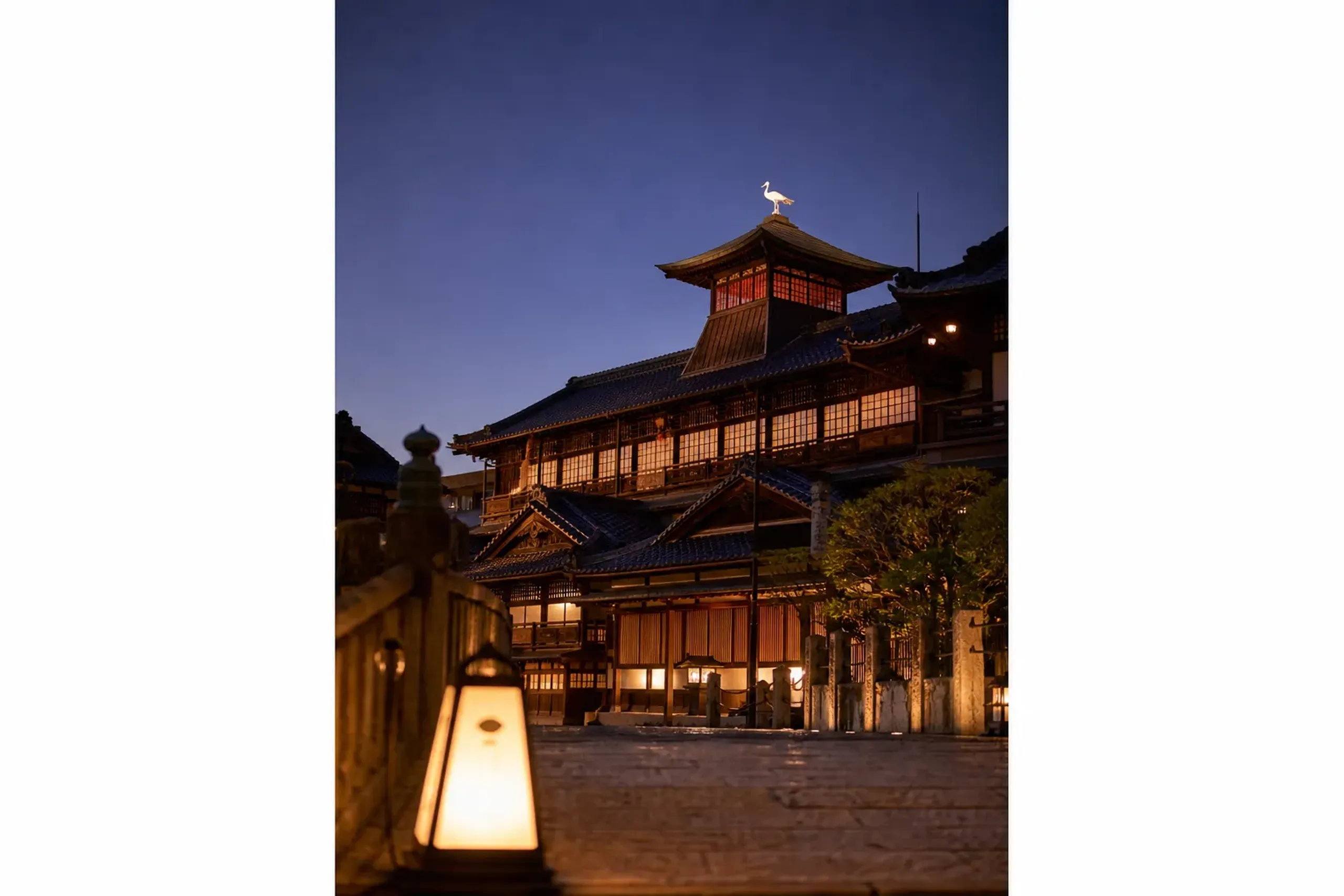 The three-storey wooden Dōgo Onsen Honkan of 1894 in Matsuyama, an Important Cultural Property, crowned by the Shinrokaku turret with its white heron figure on the roof