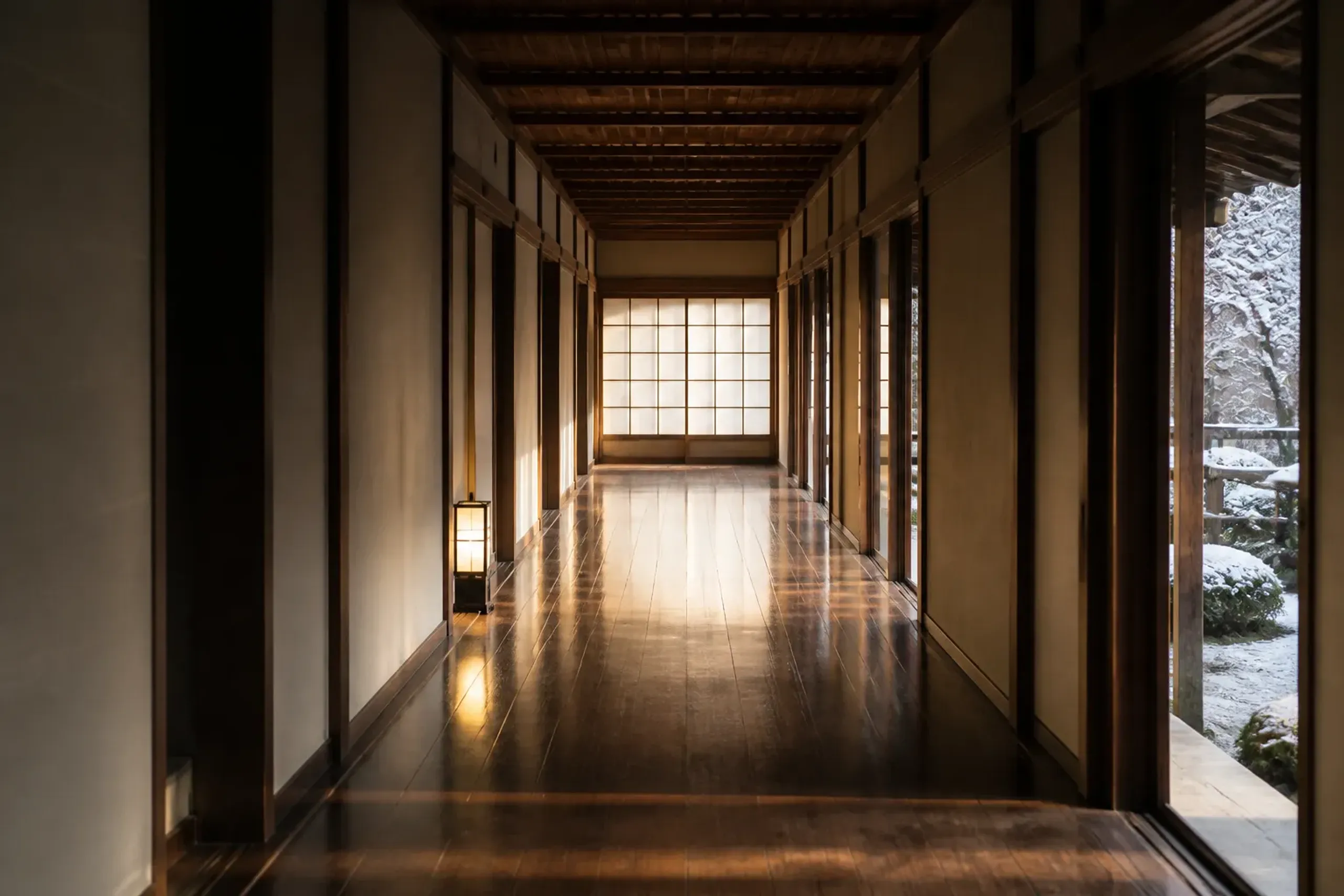 Quiet Japanese hotel corridor with soft natural light and no people