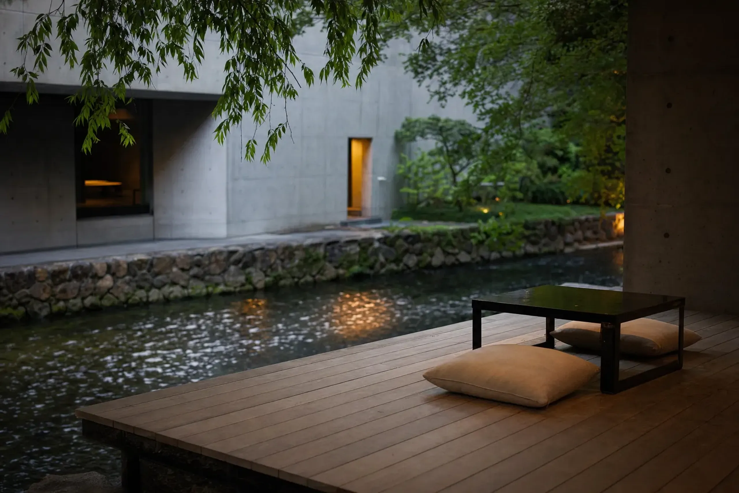The riverside terrace seating of The Shinmonzen beside the Shirakawa River in warmer months