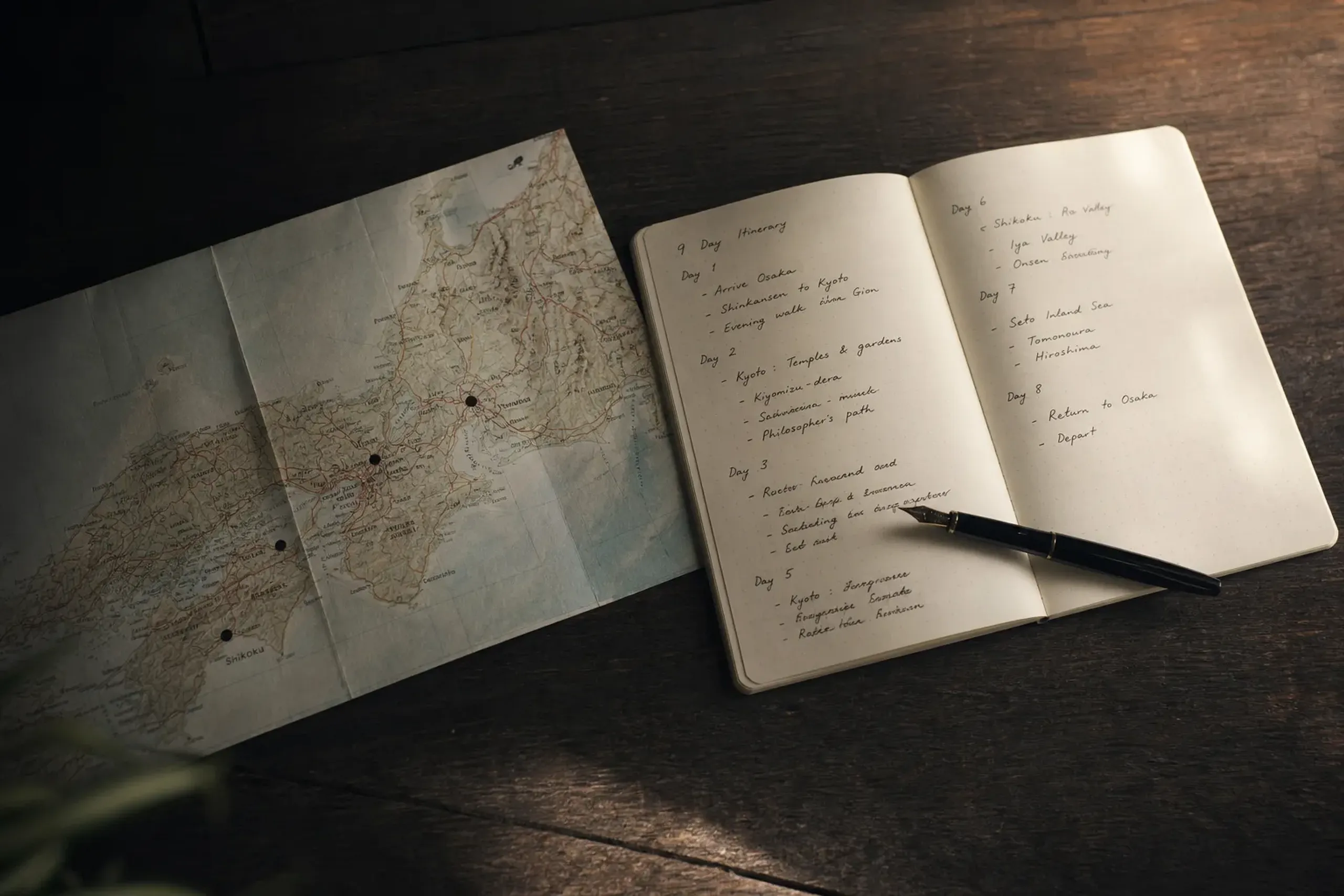 Notebook itinerary and map of Japan marked with Kyoto, Shikoku, and Seto Inland Sea destinations