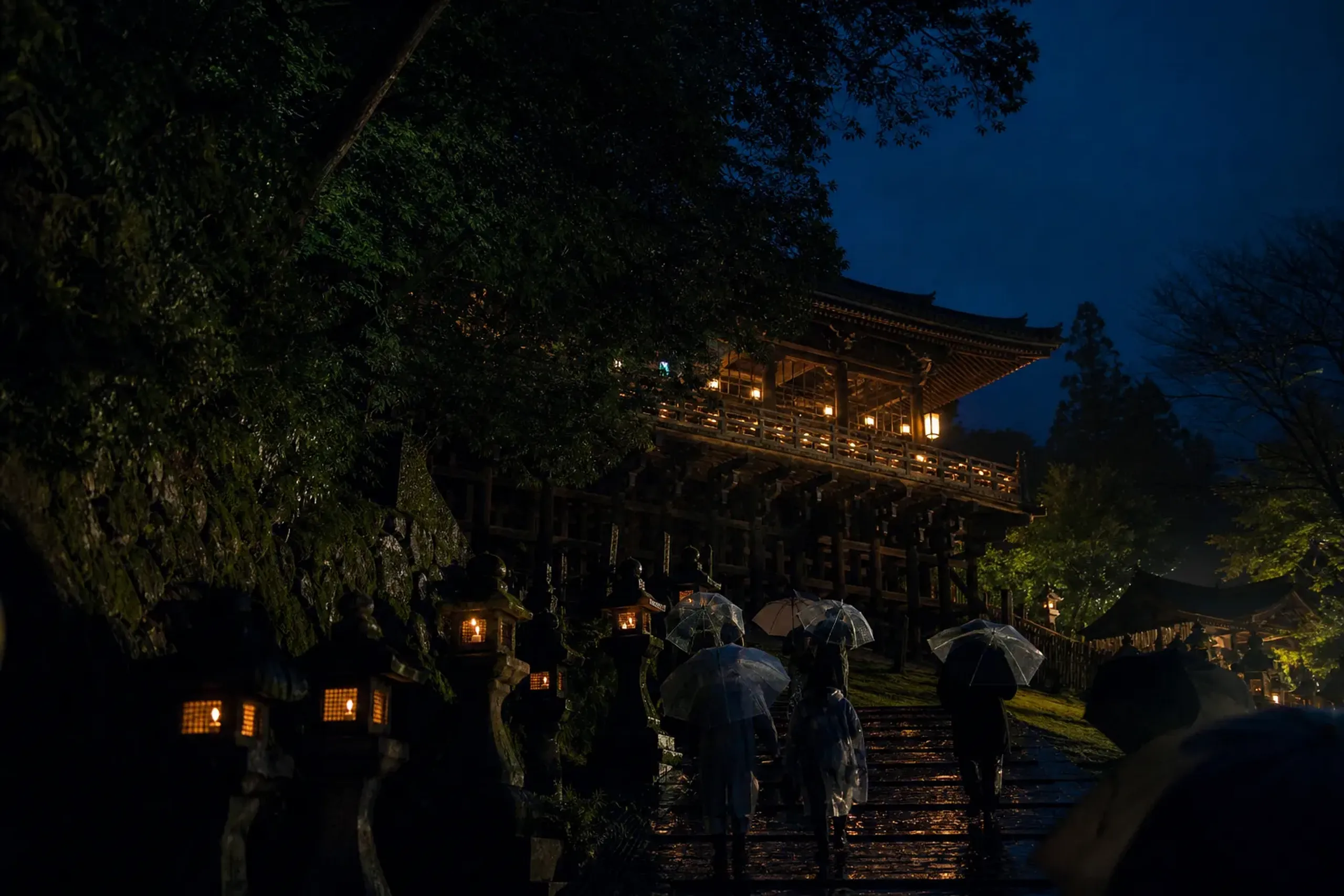 Visitors gather below Tōdai-ji Nigatsu-dō at dusk during Shuni-e in early March