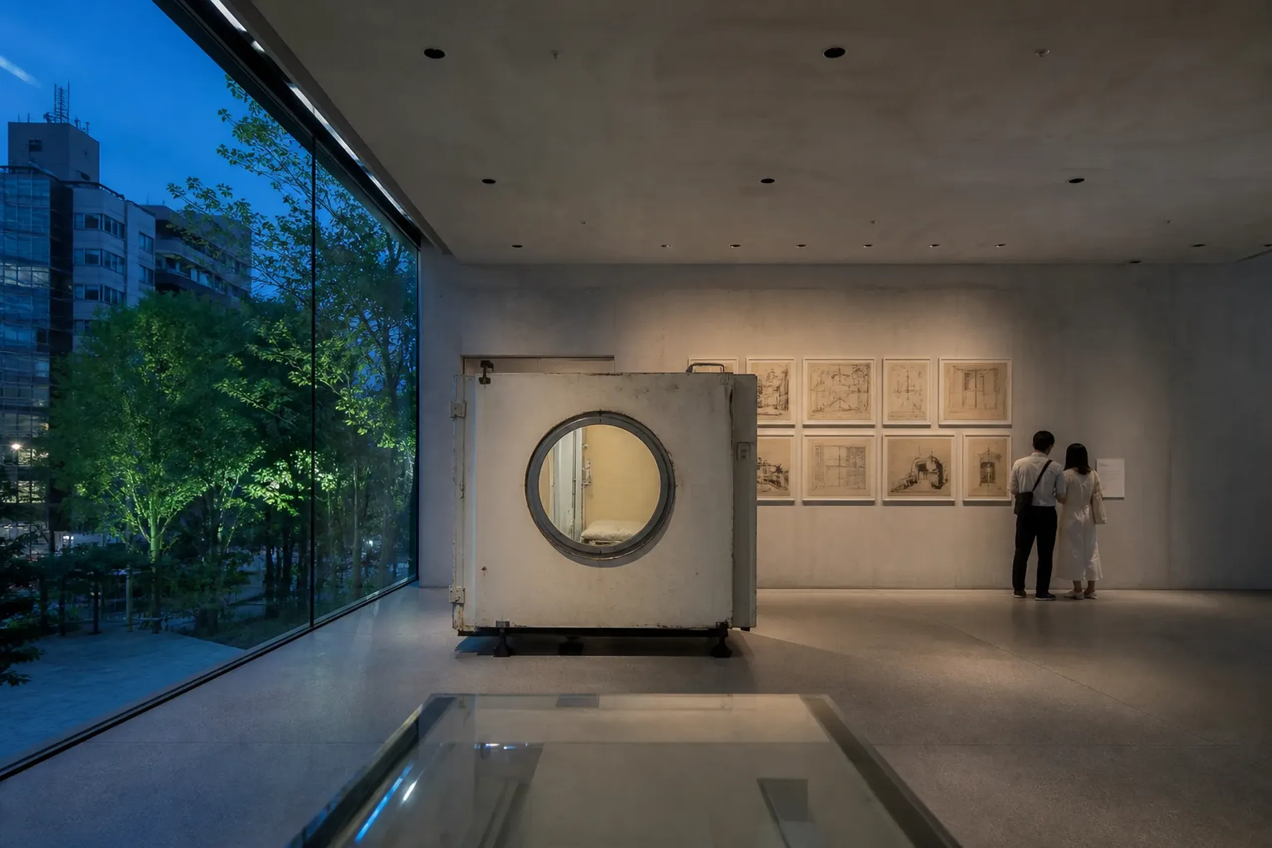 Archival exhibition display about modular architecture and the Nakagin Capsule Tower concept