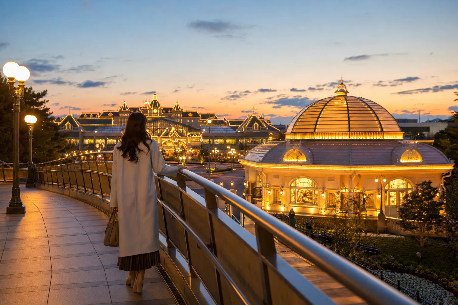 Capture of the Tokyo Disney Resort entrance featuring the Bon Voyage Store and pedestrian bridge. — Photo by Dmitry Romanoff on Pexels
