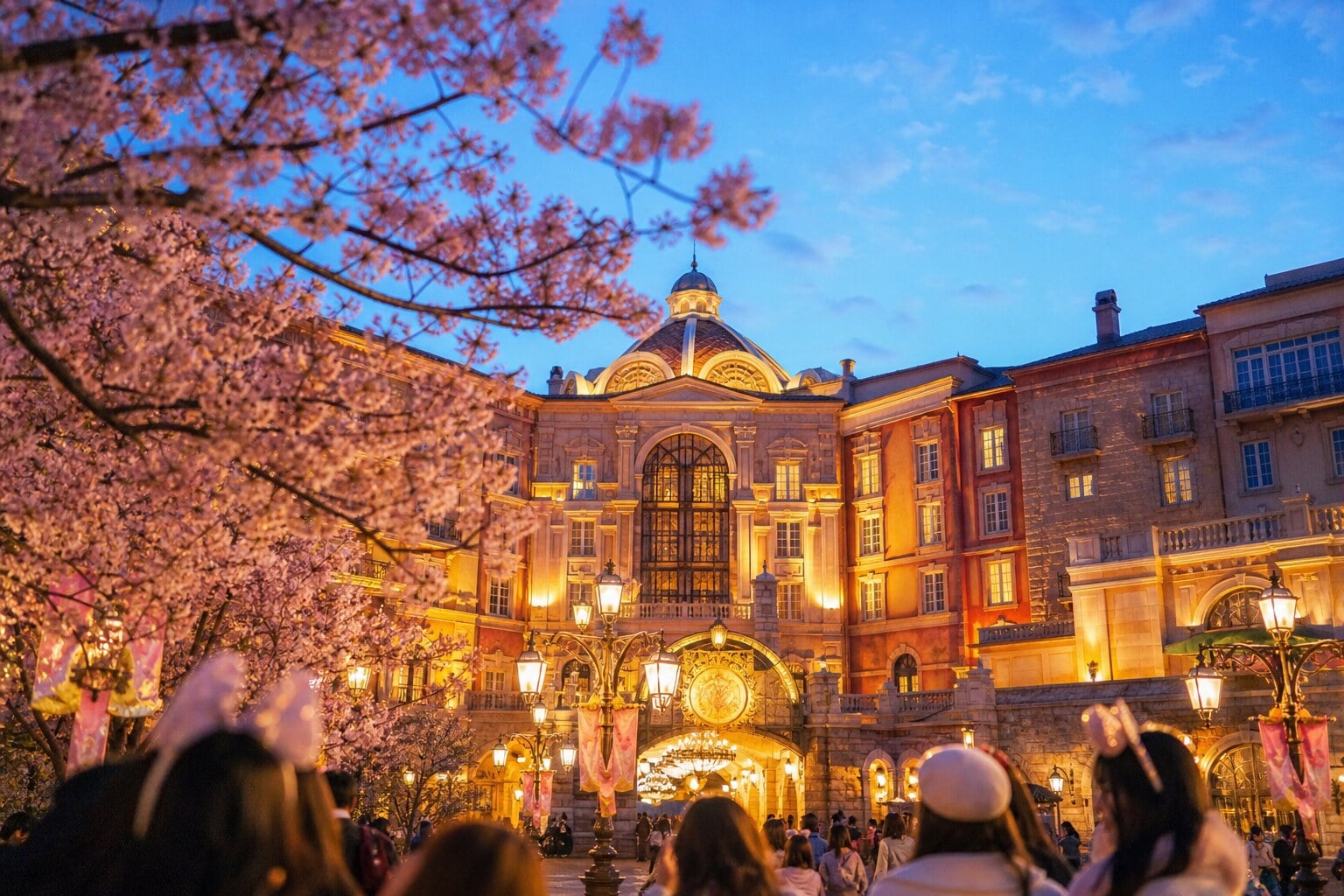 Exterior of Tokyo DisneySea Hotel MiraCosta with warm lights and arched windows