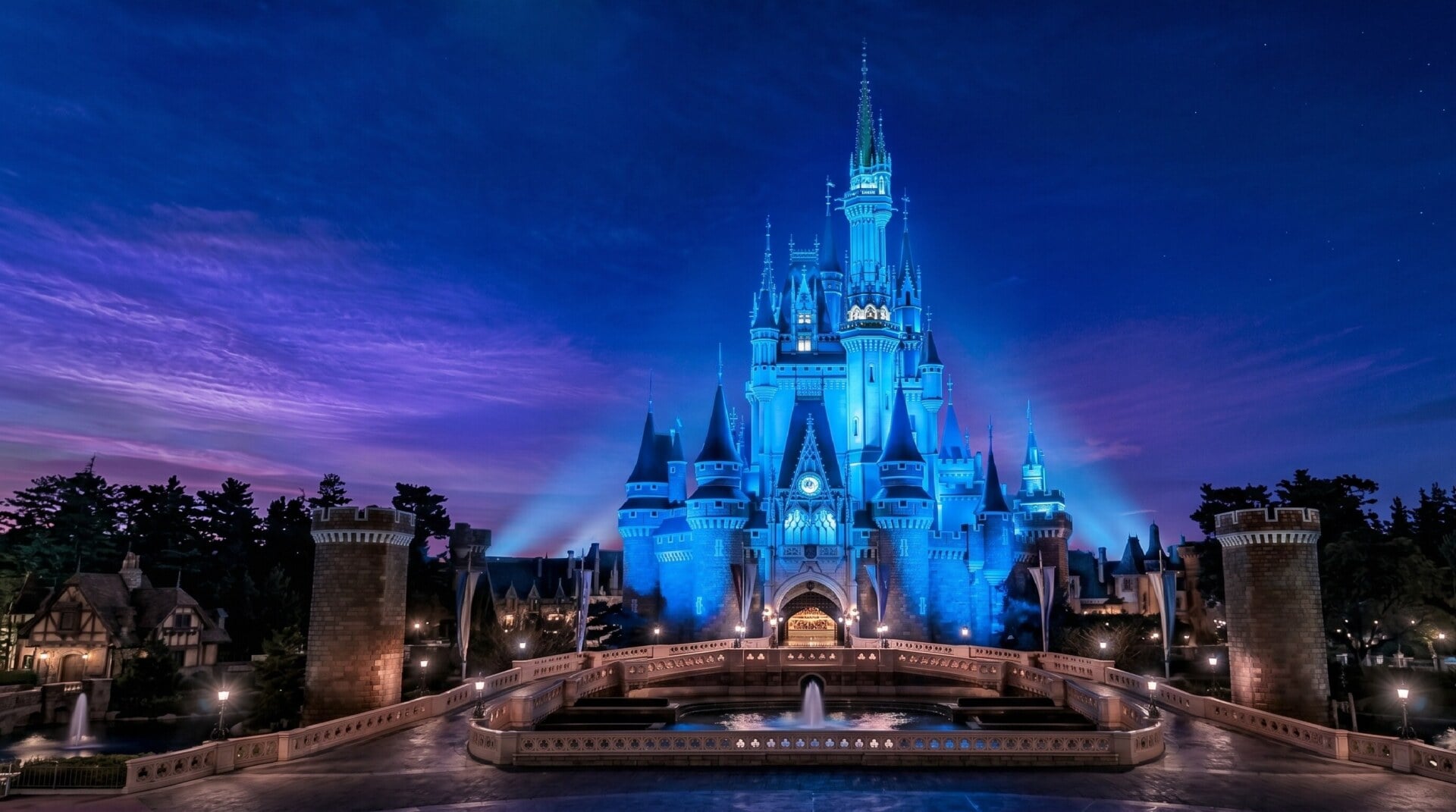 Cinderella Castle illuminated at blue hour, the quiet luxury of Tokyo Disneyland at dusk.