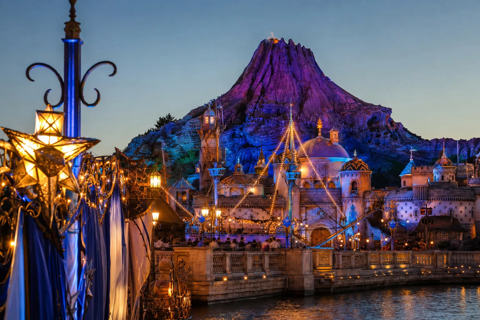 Tokyo DisneySea Mediterranean Harbor at dusk with blue-toned anniversary lighting during Sparkling Jubilee