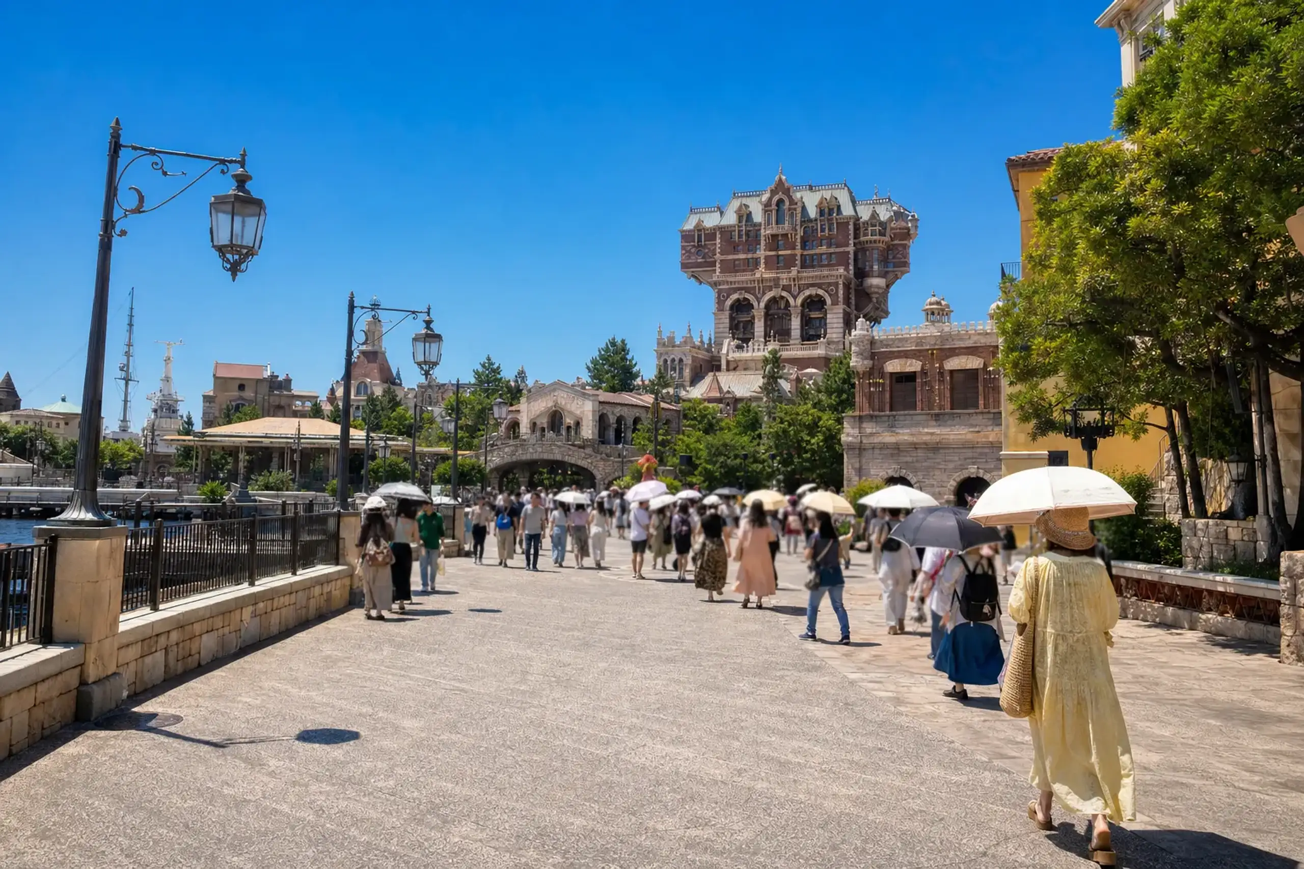 Guests walking at Tokyo DisneySea in strong July sun with parasols and heat shimmering on the pavement